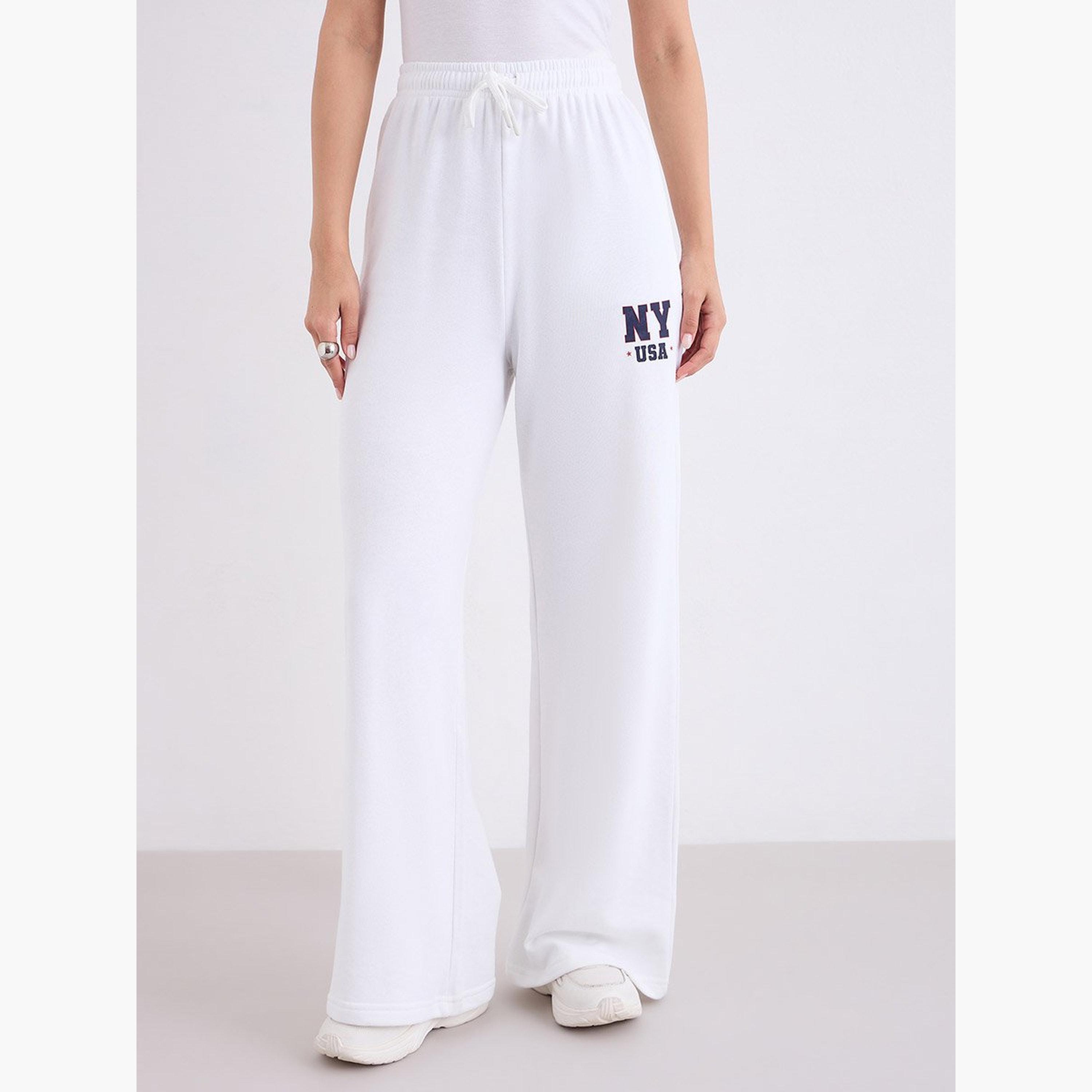 ستايلي - بنطال رياضي للنساء واسع الساق لون أبيض العاجي-women-clothing-bottoms-joggers-image-1