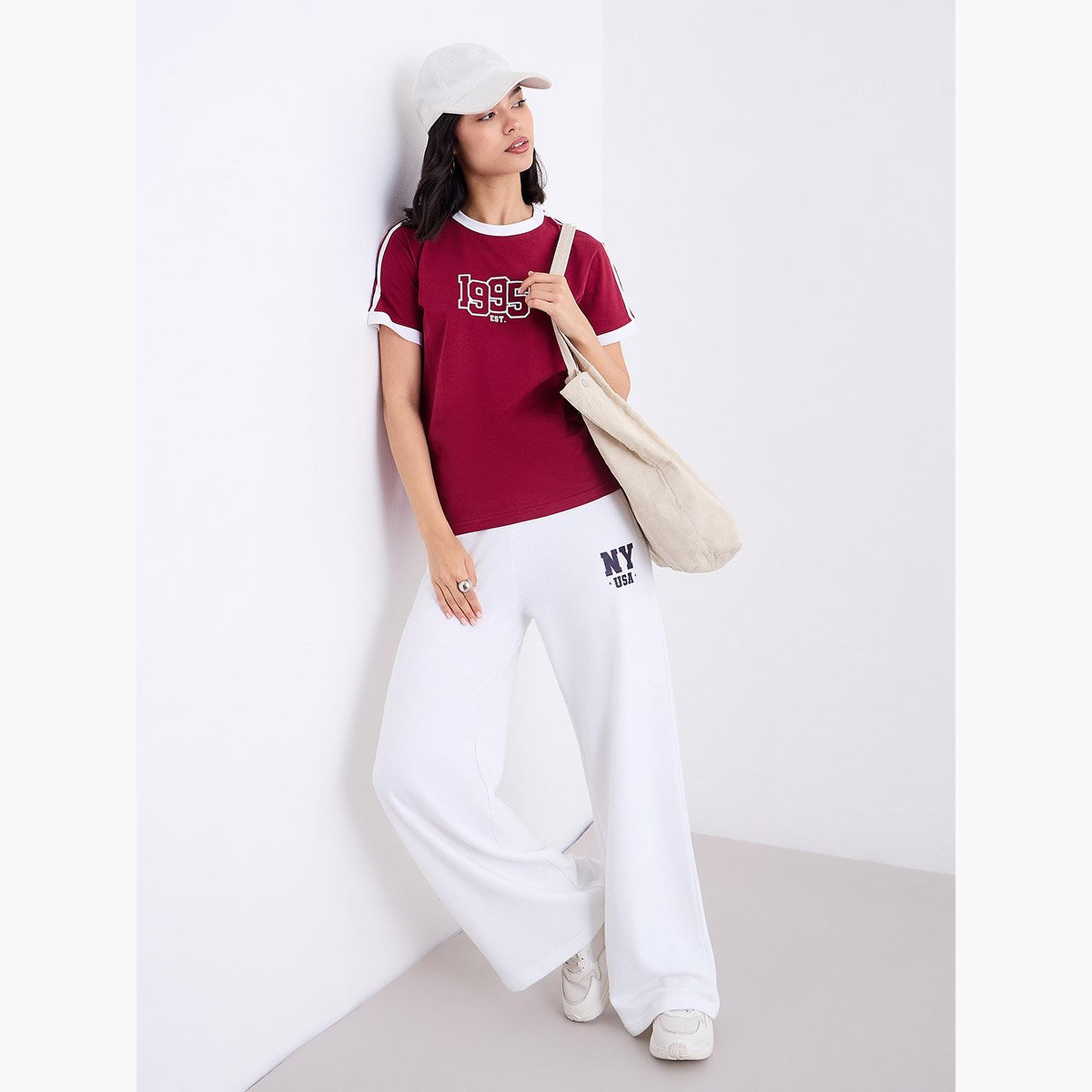 ستايلي - بنطال رياضي للنساء واسع الساق لون أبيض العاجي-women-clothing-bottoms-joggers-image-2