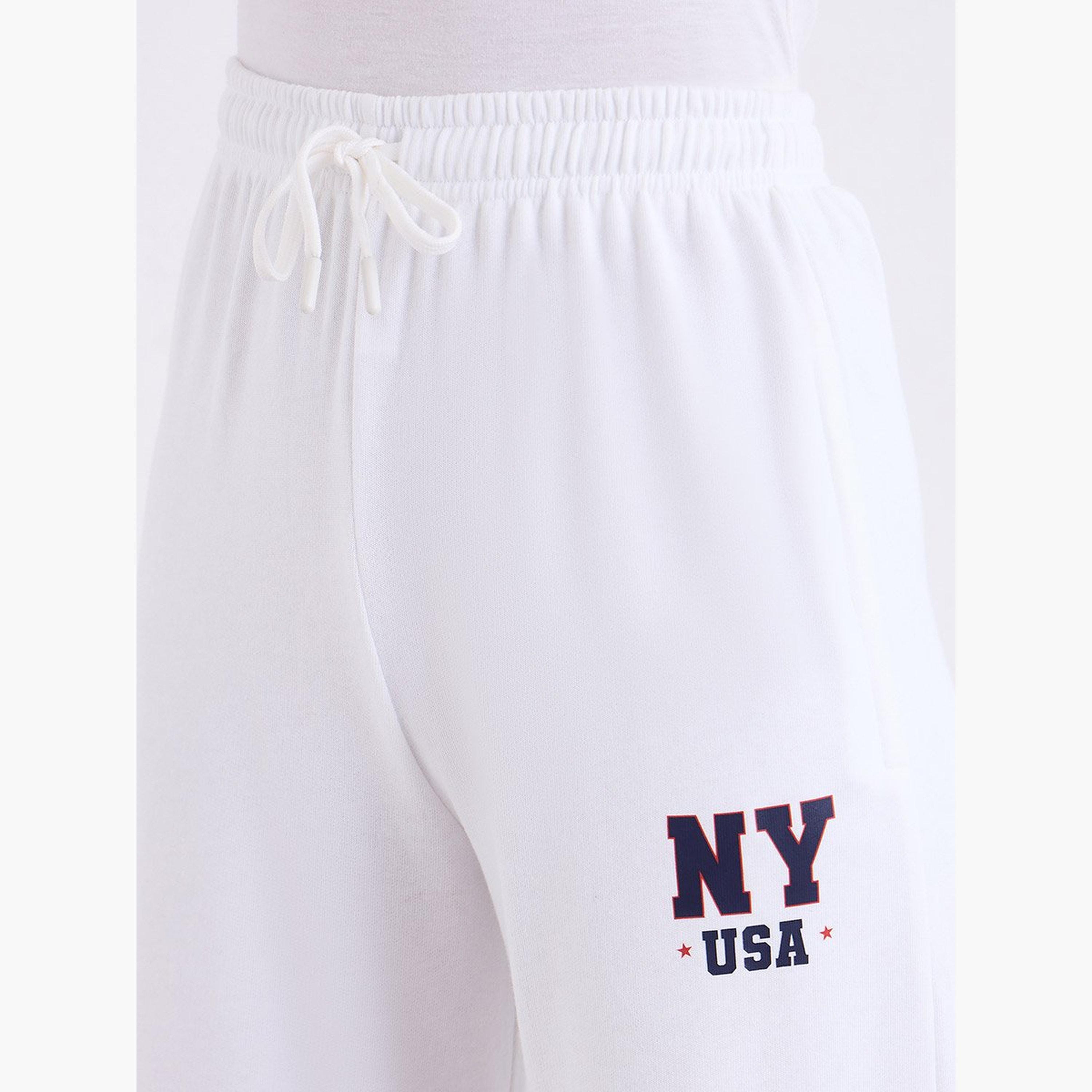 ستايلي - بنطال رياضي للنساء واسع الساق لون أبيض العاجي-women-clothing-bottoms-joggers-image-4
