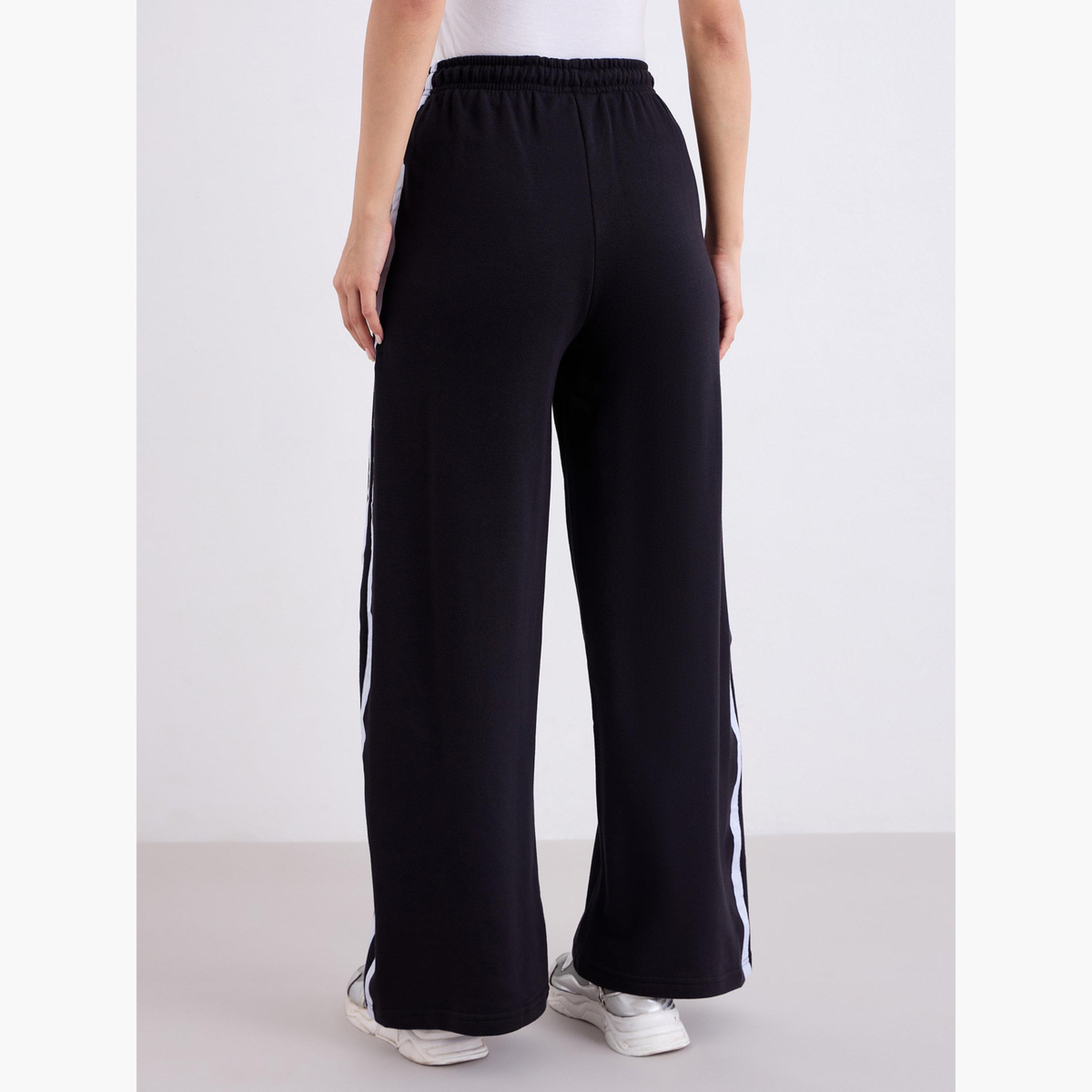 ستايلي - بنطال رياضي واسع الساق مع بشريط جانبي أسود-women-clothing-bottoms-joggers-image-4
