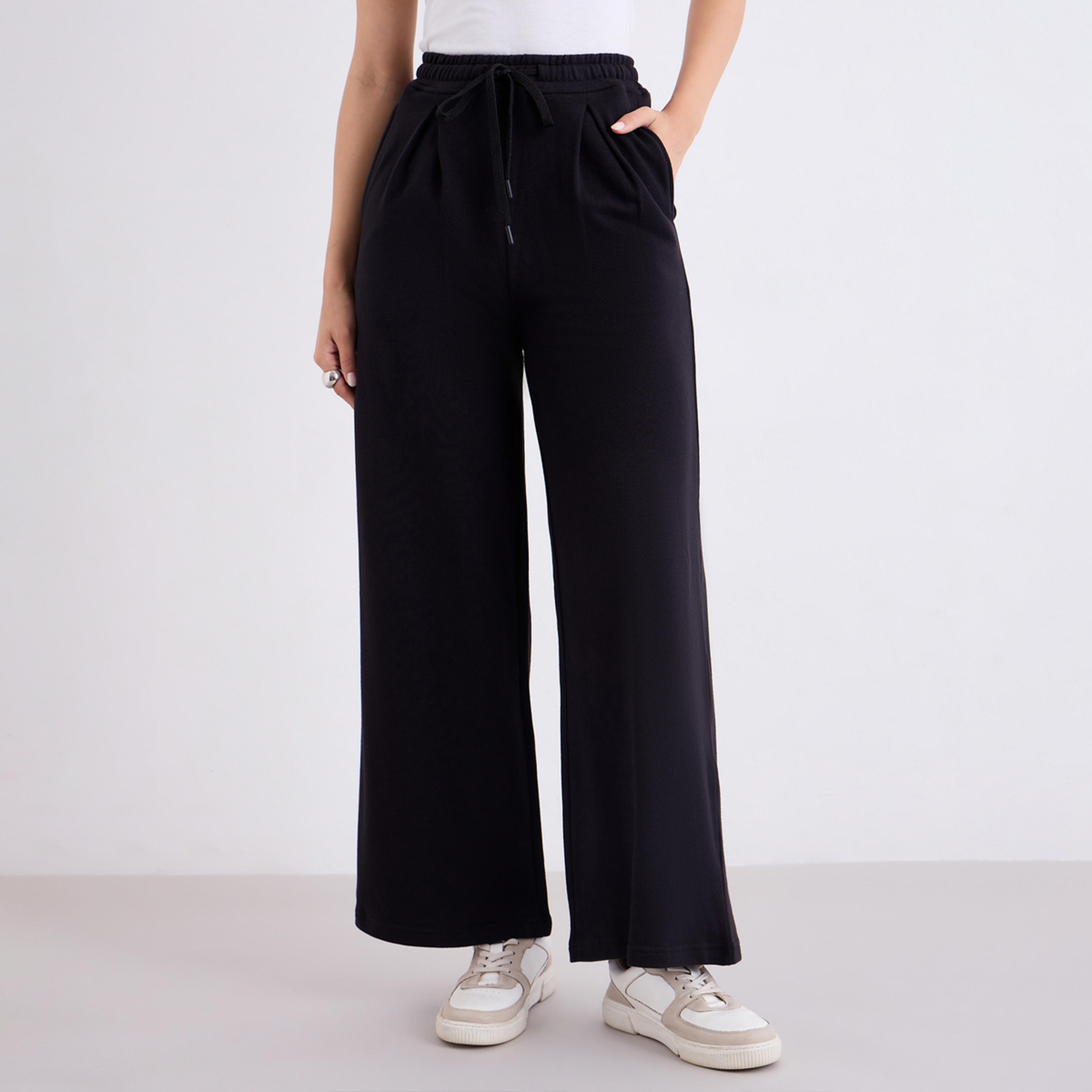 ستايلي - بنطال رياضي أسود واسع الساق مع تفاصيل مطوية-women-clothing-bottoms-joggers-image-1
