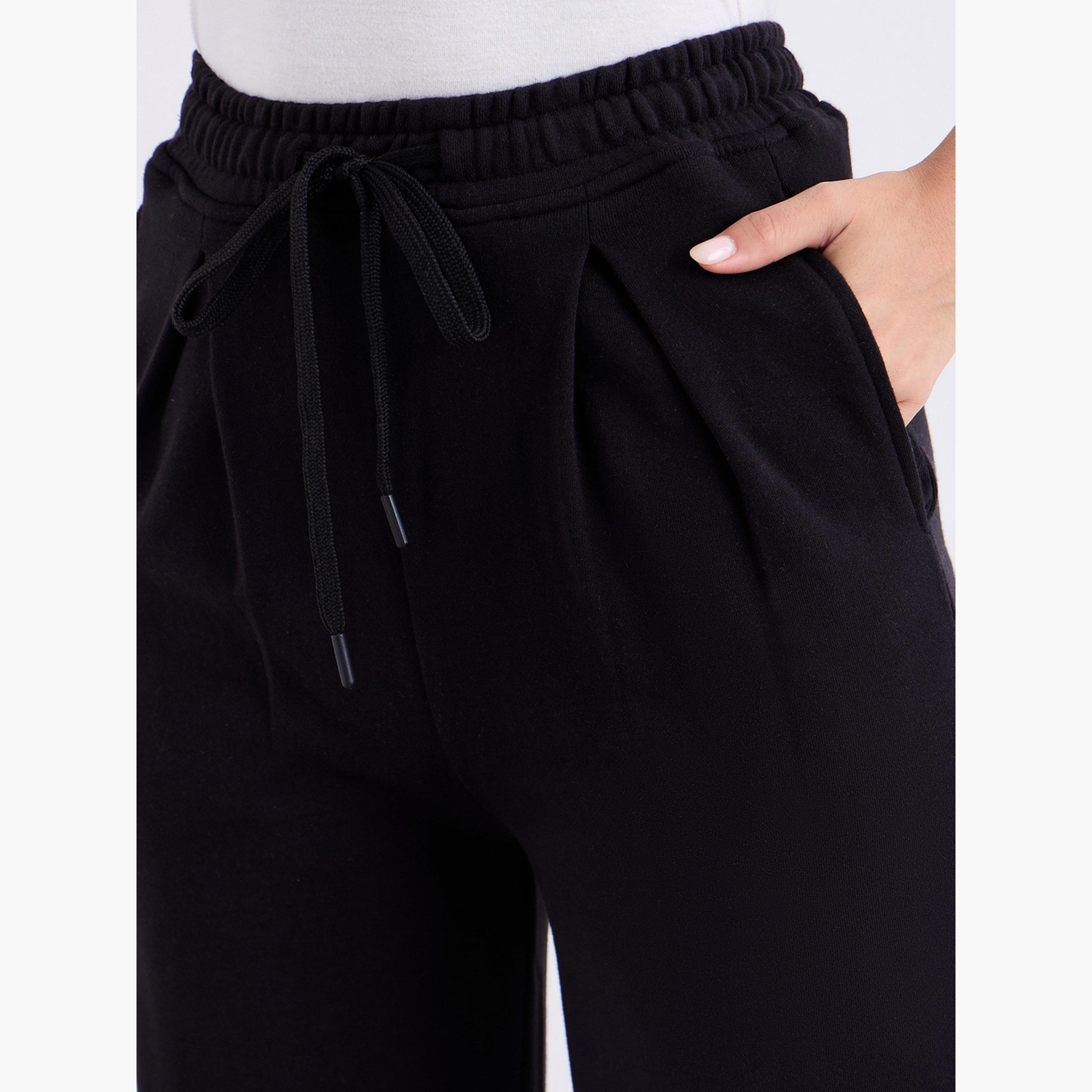 ستايلي - بنطال رياضي أسود واسع الساق مع تفاصيل مطوية-women-clothing-bottoms-joggers-image-5