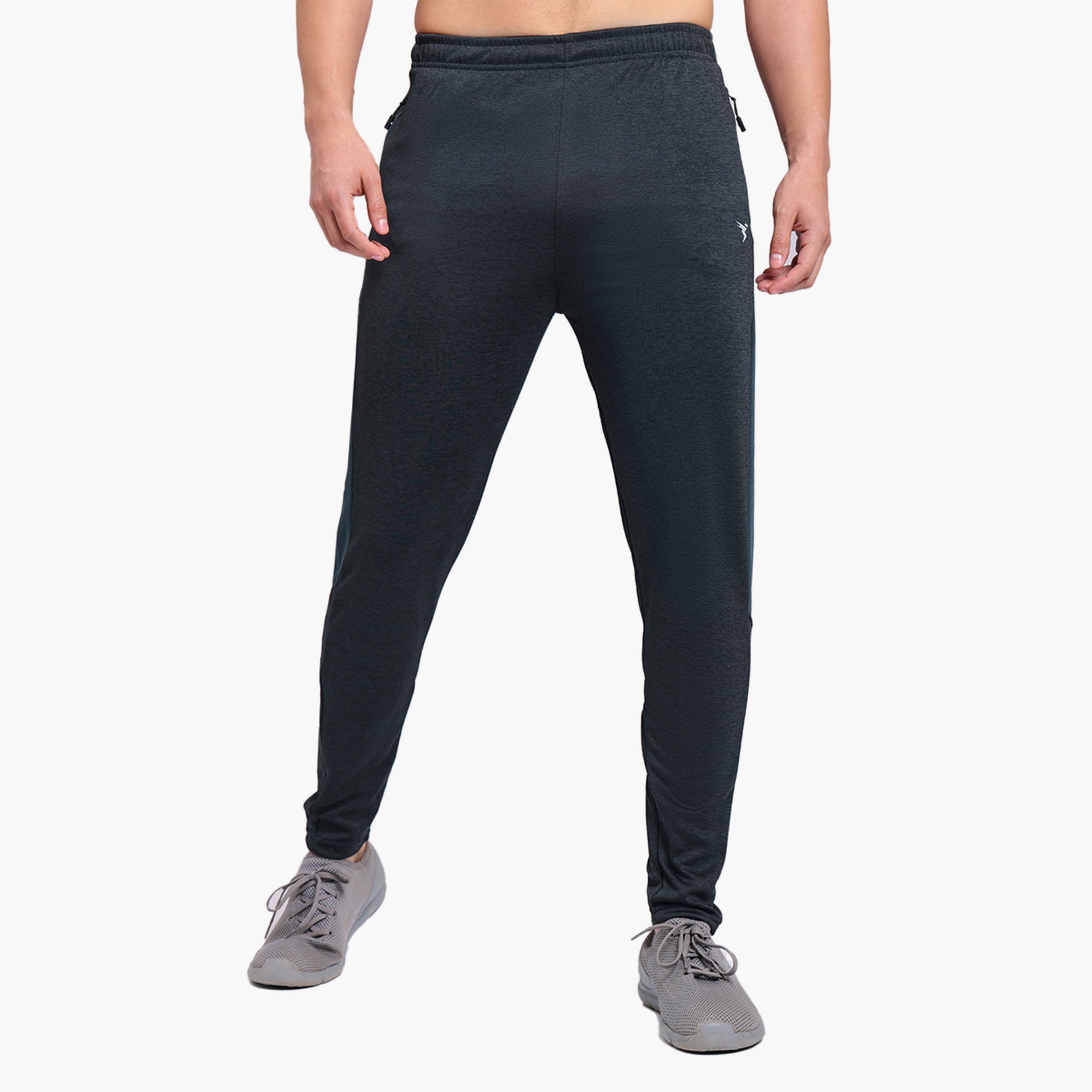 تكنوسبورت × ستايلي - بنطال رياضي رجالي ضيق موشح بقماش تكنو دراي-men-clothing-sportswearandactivewear-bottoms-joggers-image-1