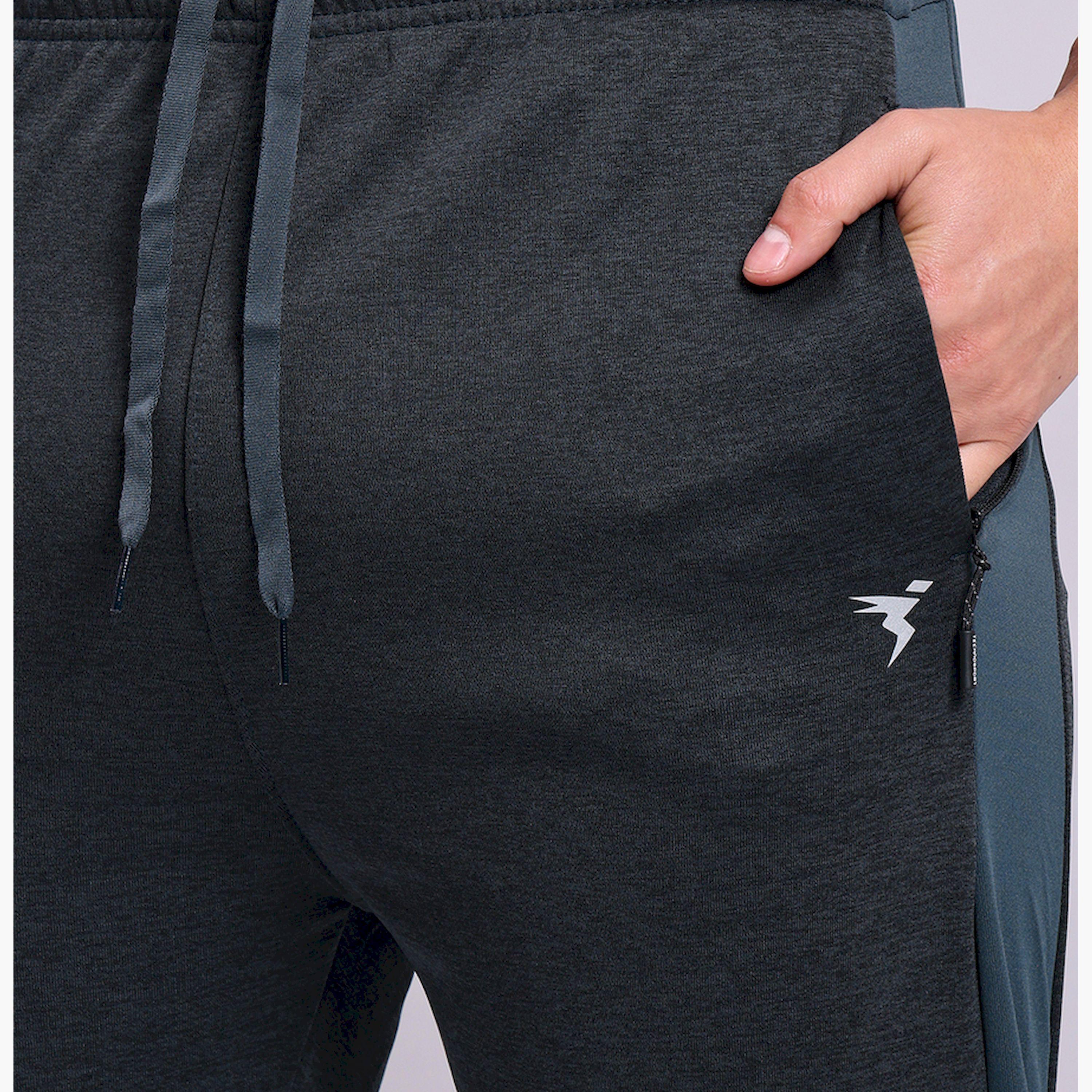 تكنوسبورت × ستايلي - بنطال رياضي رجالي ضيق موشح بقماش تكنو دراي-men-clothing-sportswearandactivewear-bottoms-joggers-image-4