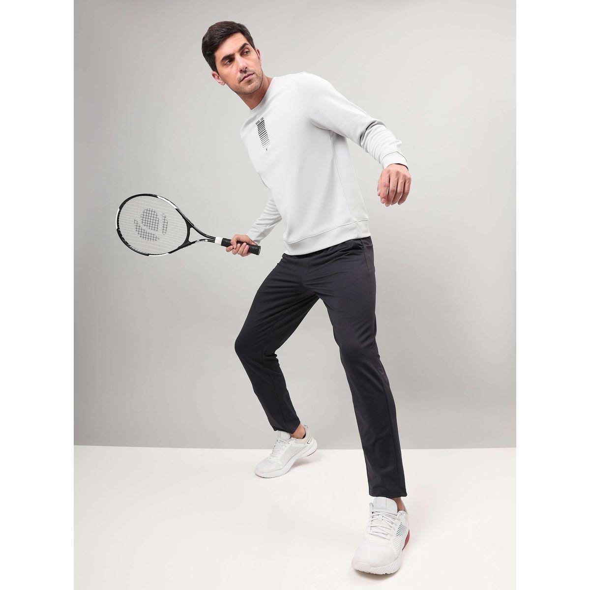 بنطال رياضي سادة بقصة مريحة وتقنية دوراكول-men-clothing-sportswearandactivewear-bottoms-image-2