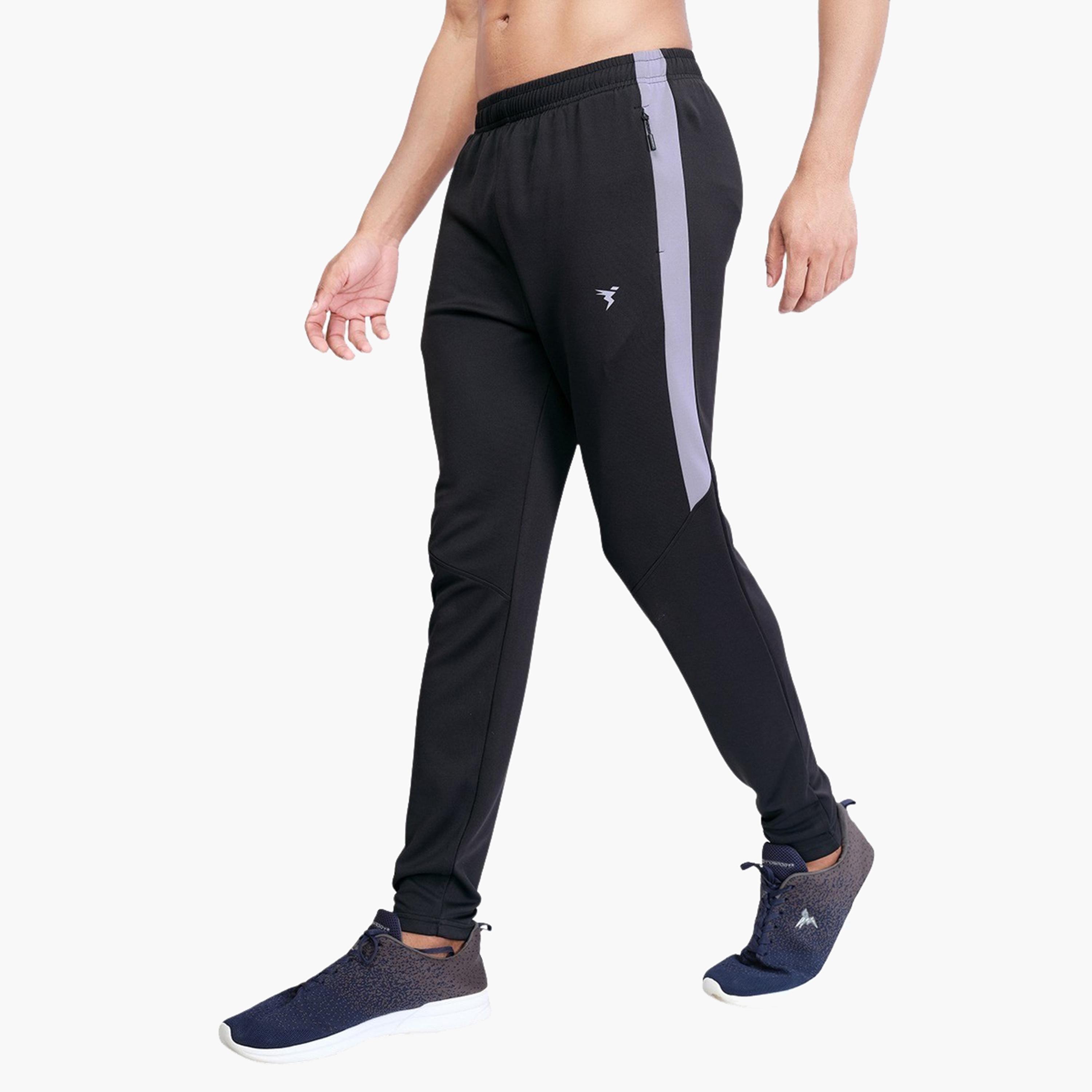 تكنوسبورت × ستايلي - بنطال رياضي رجالي ضيق سادة بقماش تكنو دراي-men-clothing-sportswearandactivewear-bottoms-joggers-image-2