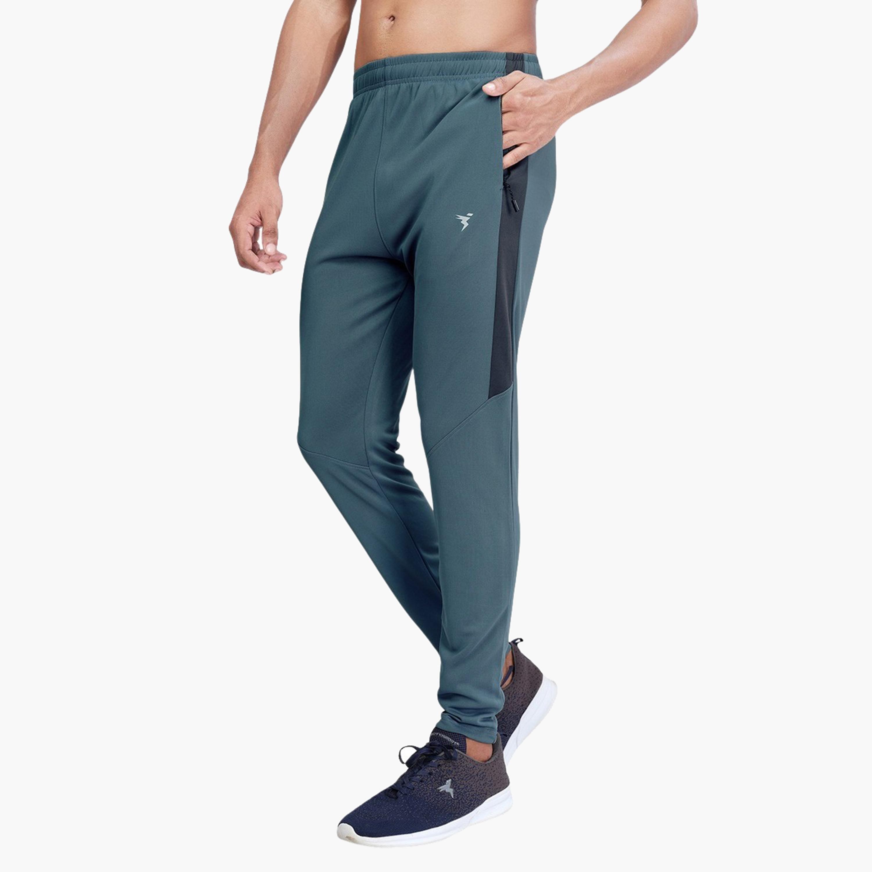 تكنوسبورت × ستايلي - بنطال رياضي رجالي ضيق سادة بقماش تكنو دراي-men-clothing-sportswearandactivewear-bottoms-joggers-image-3