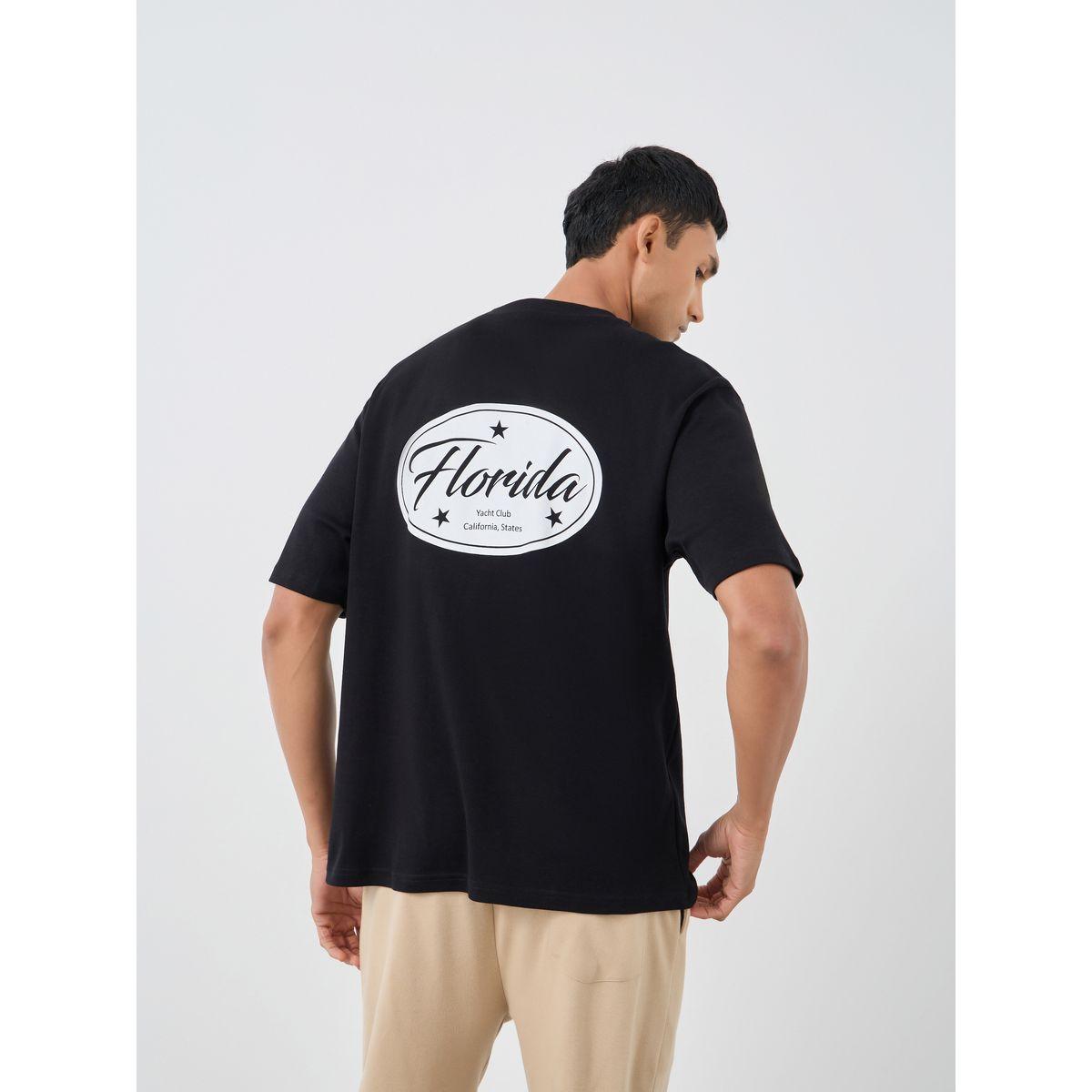 تيشيرت فضفاض بطبعة جرافيك وياقة دائرية-men-clothing-tshirtsandpolos-tshirts-image-1