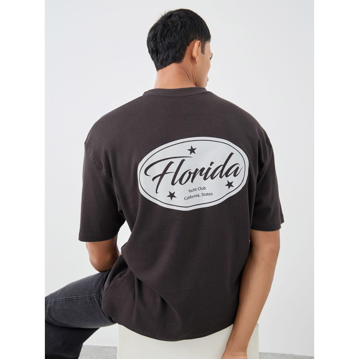 تيشيرت فضفاض بطبعة جرافيك وياقة دائرية-men-clothing-tshirtsandpolos-tshirts-image-1