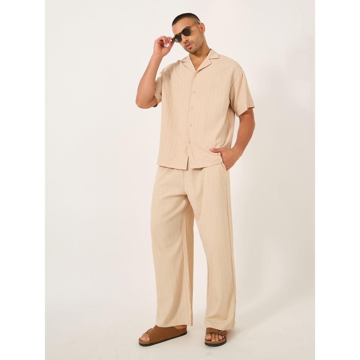 بنطال سادة بأرجل واسعة وخصر مطاطي-men-clothing-bottoms-trousersandchinos-trousers-image-1