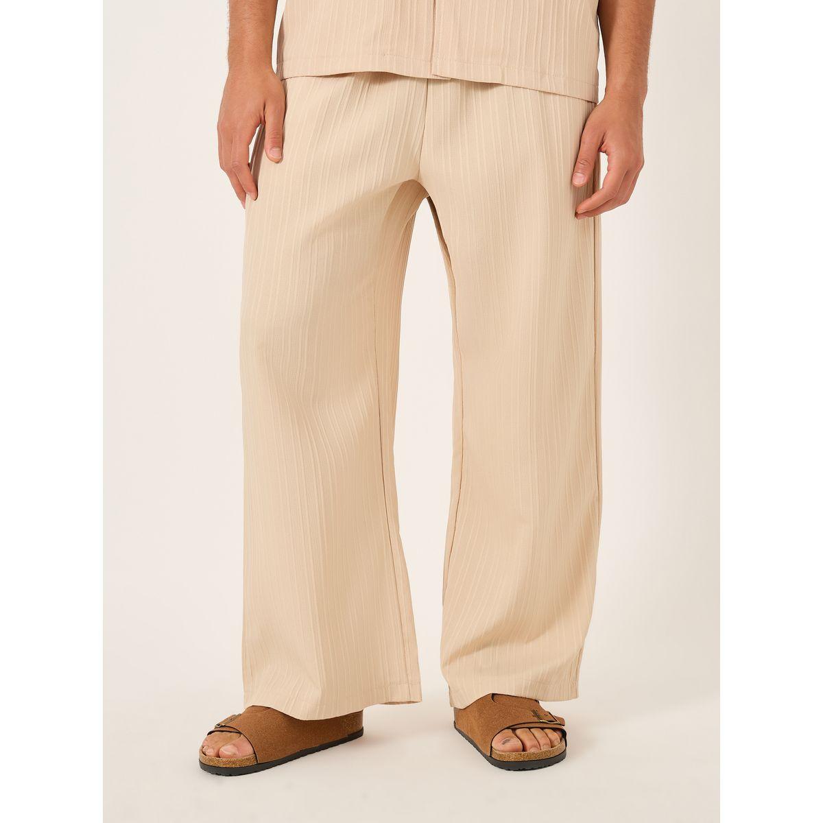 بنطال سادة بأرجل واسعة وخصر مطاطي-men-clothing-bottoms-trousersandchinos-trousers-image-2