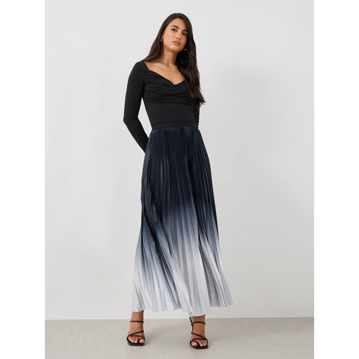 تنورة طويلة بحافة واسعة وكسرات-women-clothing-bottoms-skirts-image-1