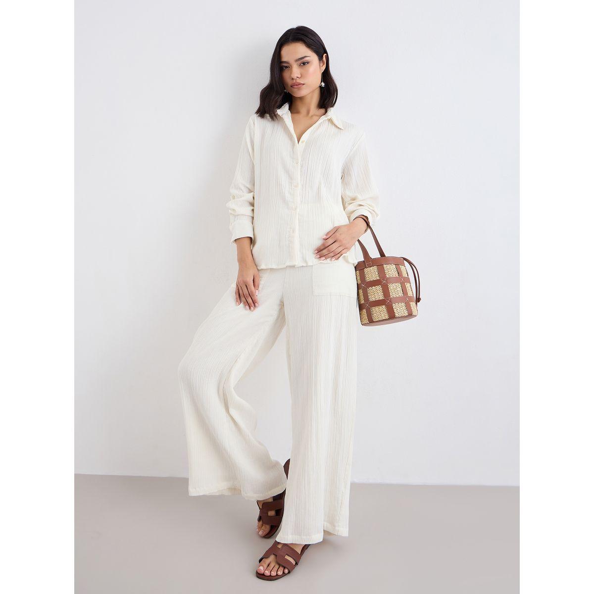 بلوزة واسعة بتفاصيل بارزة الملمس-women-clothing-shirtsandblouses-shirts-image-1