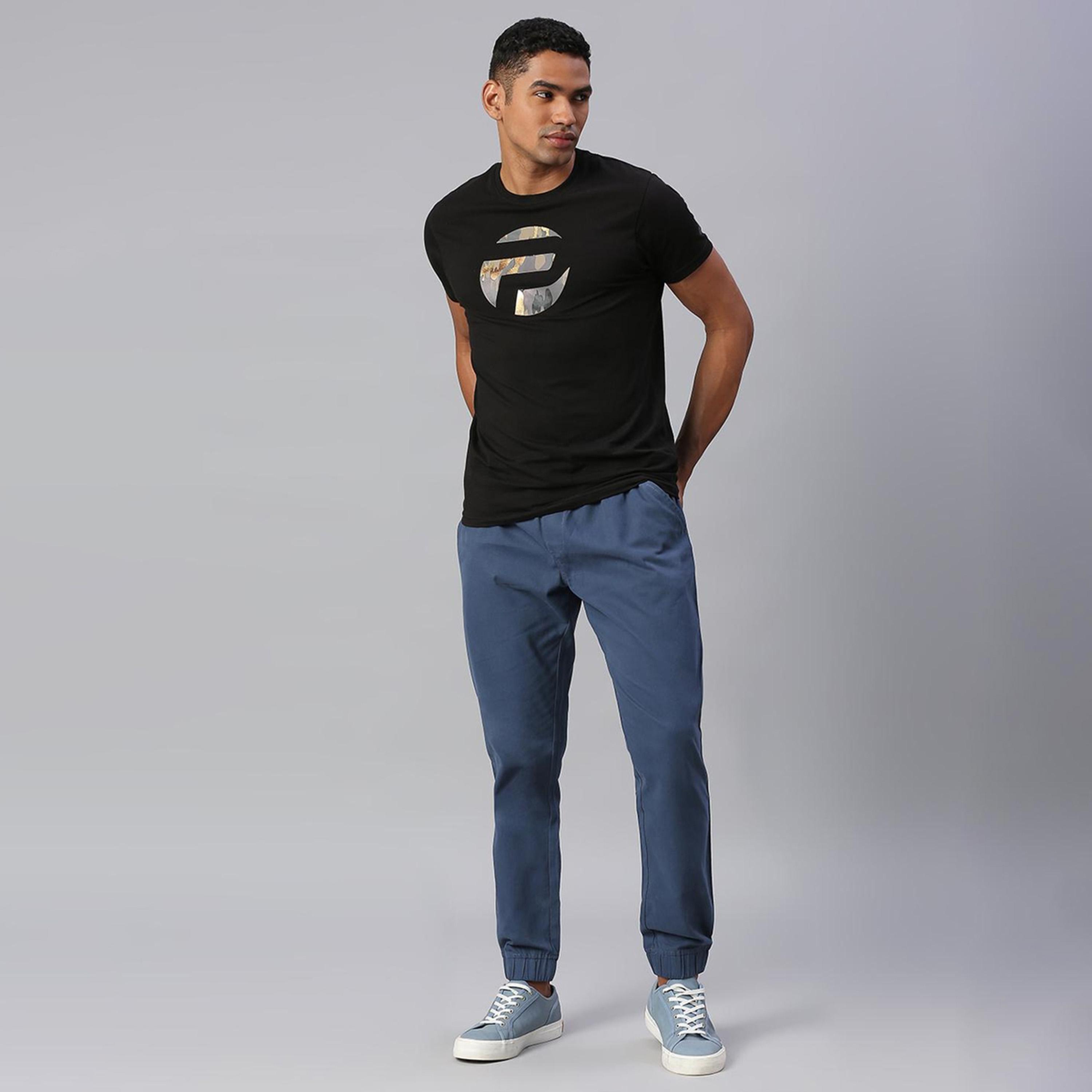 دينيس لينغو× ستايلي-  بنطال رياضي قطن بقصّة مدببة-men-clothing-bottoms-joggers-image-5