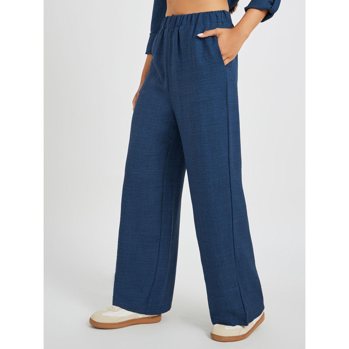 بنطال سادة بأرجل واسعة وخصر مطاطي-women-clothing-bottoms-trousers-image-2