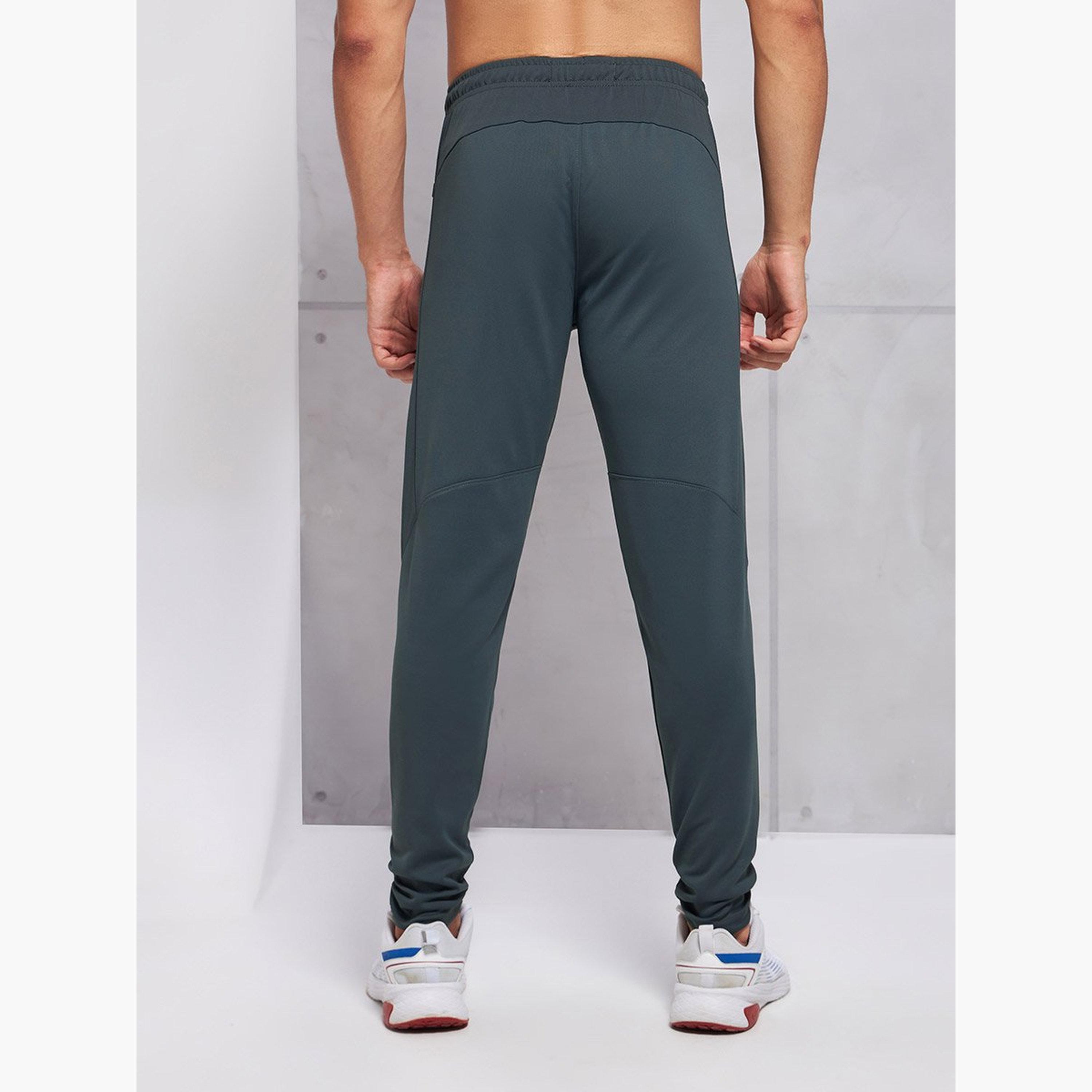 تكنوسبورت - بنطال رياضي بقصّة عادية وخصر مطاطي متين-men-clothing-sportswearandactivewear-bottoms-joggers-image-1