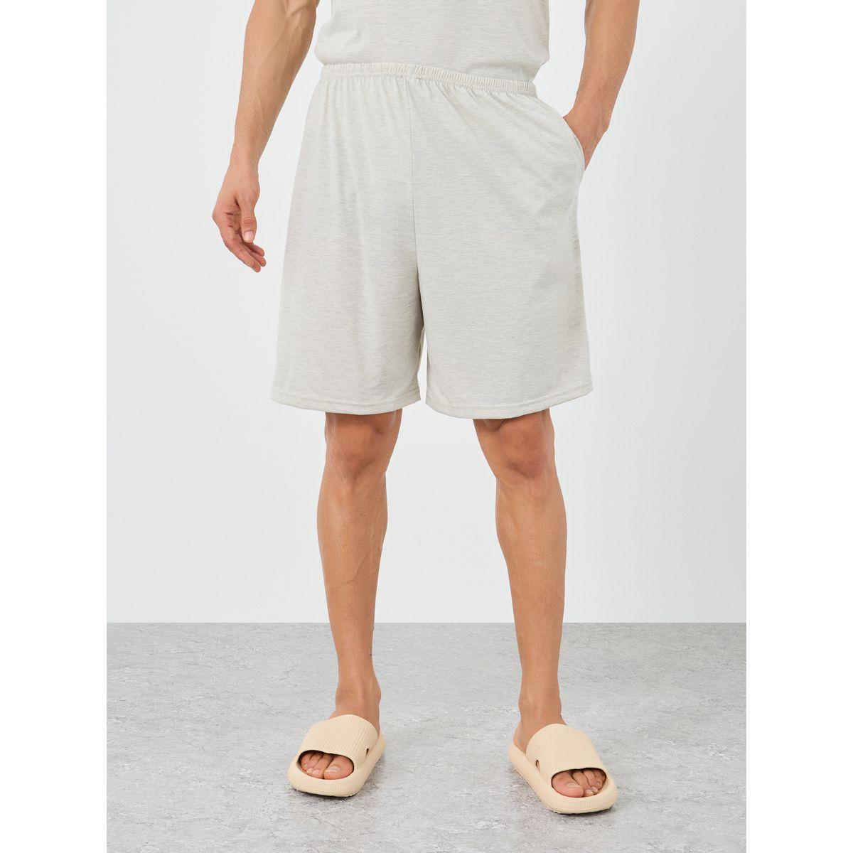 طقم من شورت بيجاما وتيشيرت مزين بشارة-men-clothing-nightwear-sets-image-5