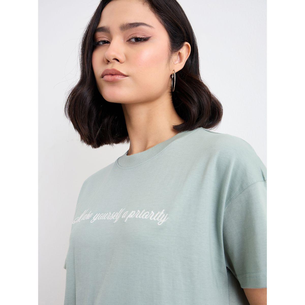 تيشيرت بقصة بوكسي وتفاصيل كتابة مُطرزة-women-clothing-tshirts-image-3