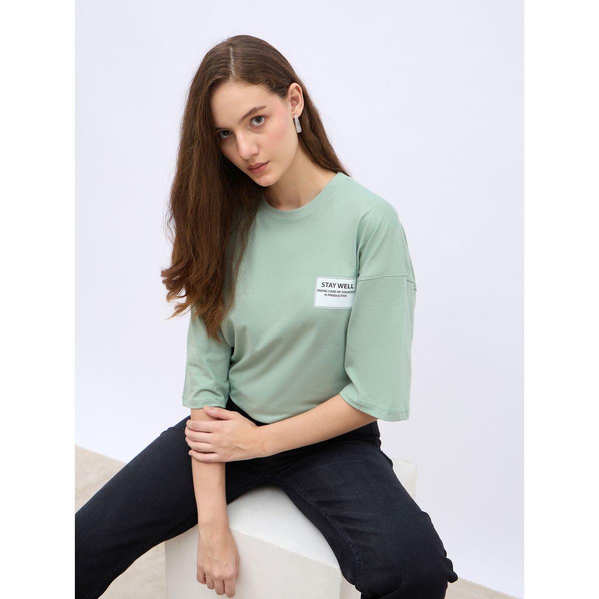 تيشيرت فضفاض طويل مزين بشارة-women-clothing-tshirts-image-6