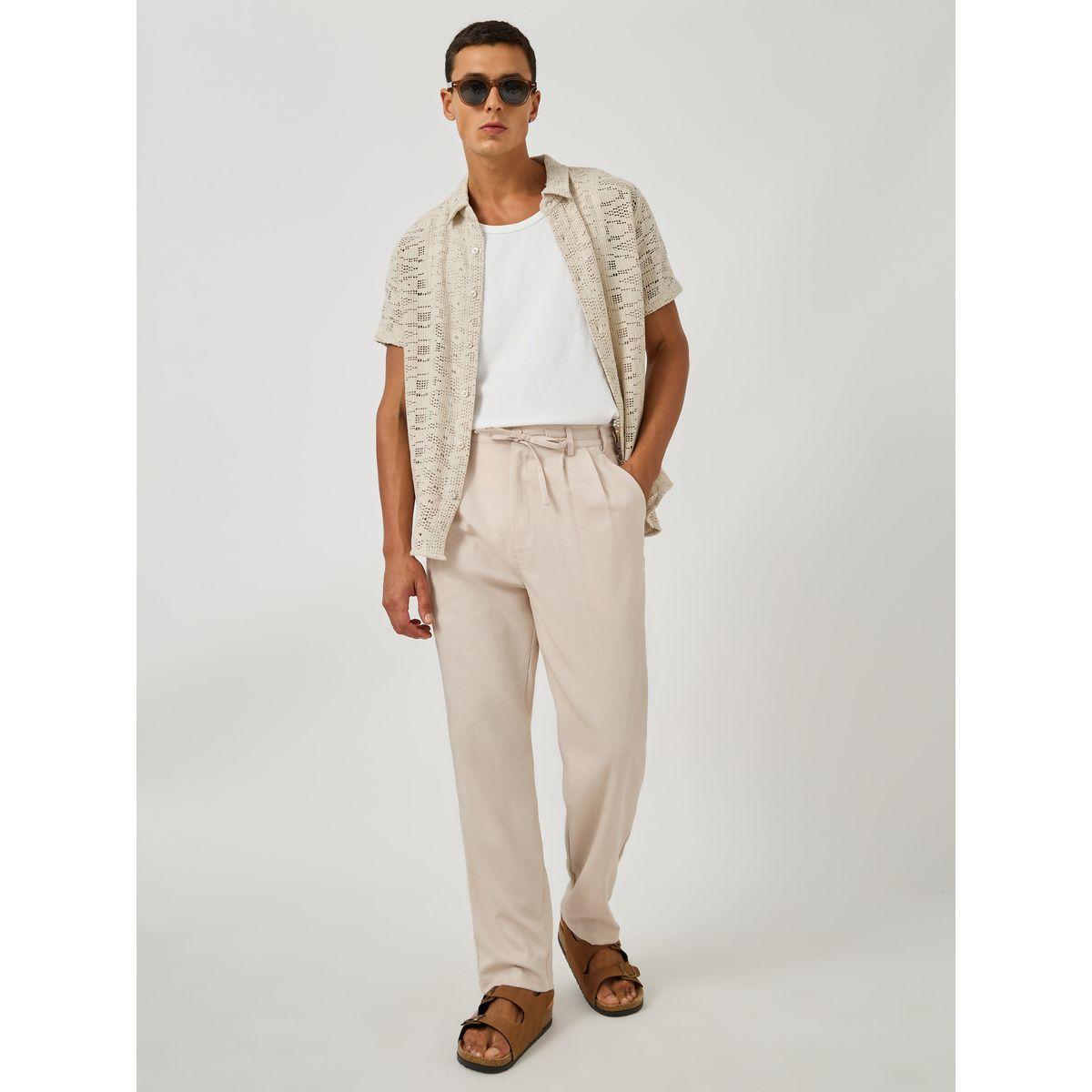 بنطال بقصة مستدقة وتفاصيل بارزة الملمس-men-clothing-bottoms-trousersandchinos-trousers-image-2