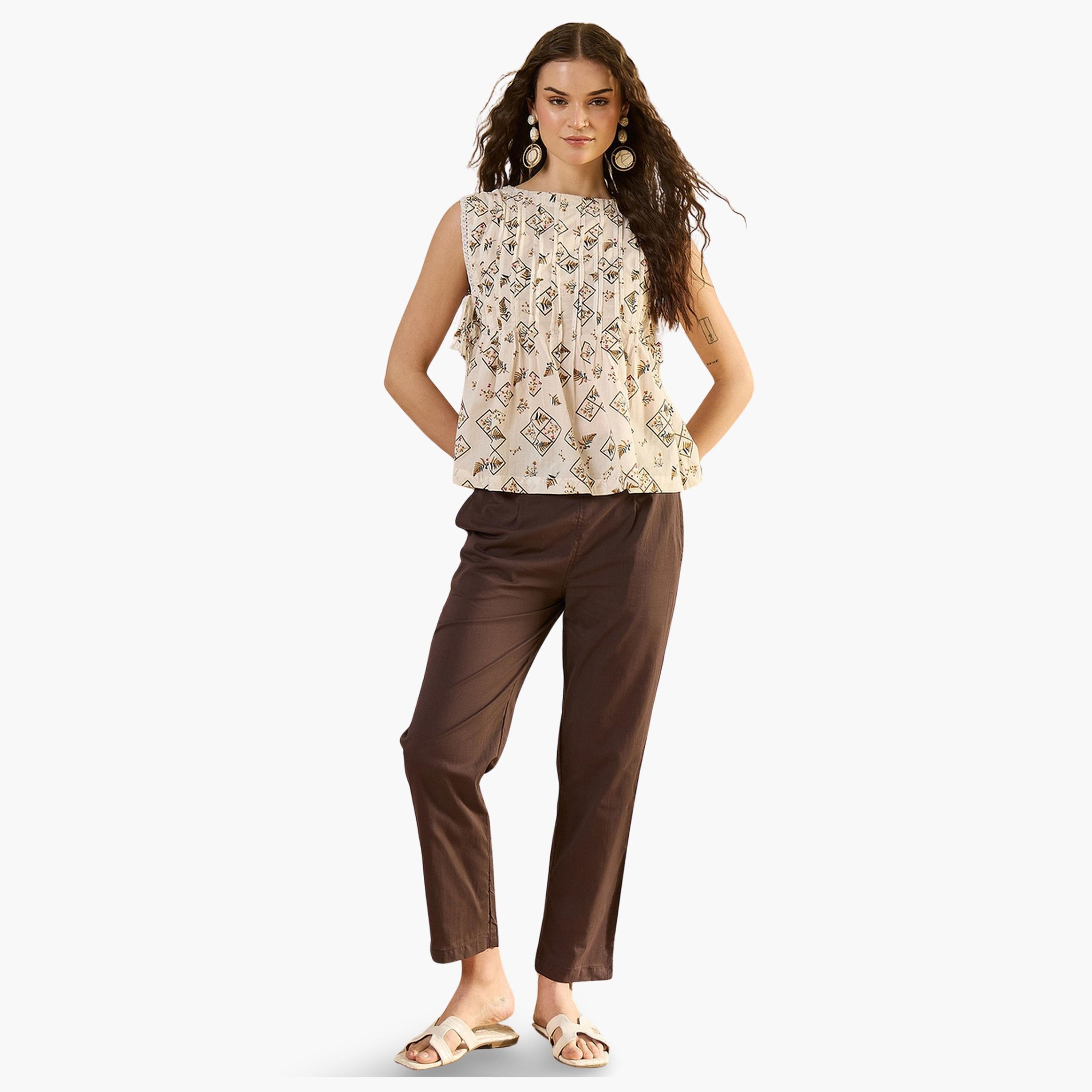 طقم منسق من بنطال بقصة عادية وبلوزة بلا أكمام-women-clothing-coordsets-image-1