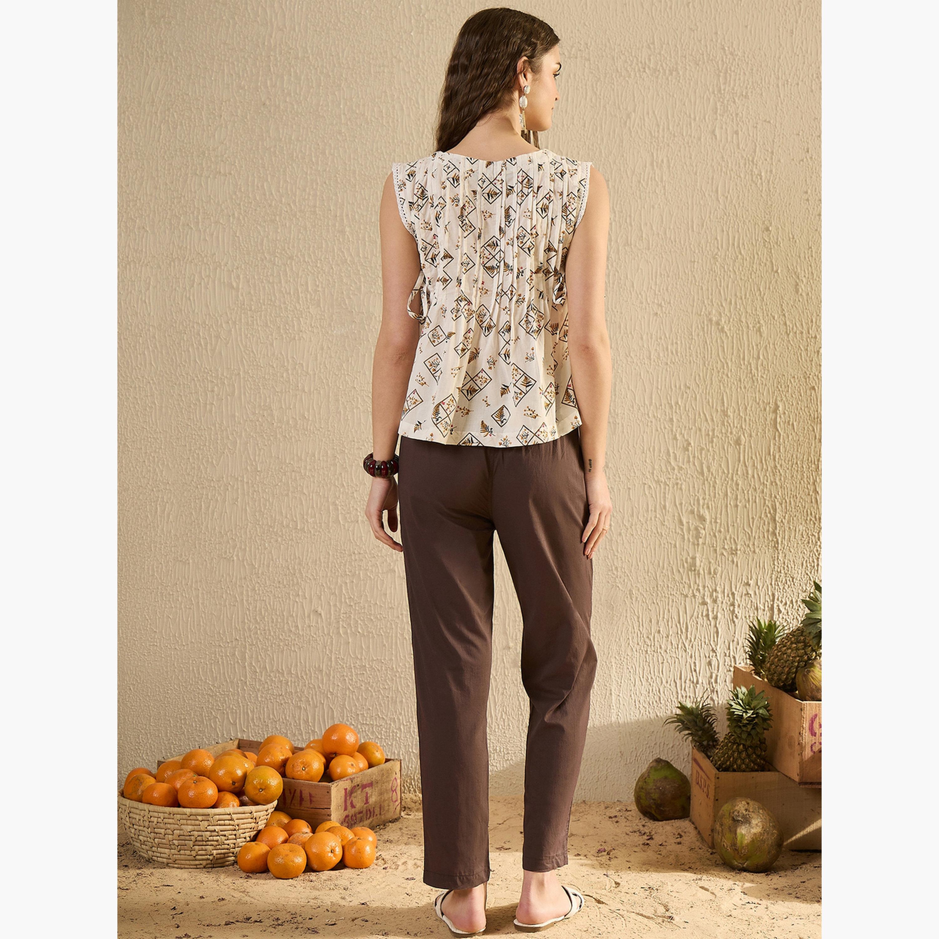 طقم منسق من بنطال بقصة عادية وبلوزة بلا أكمام-women-clothing-coordsets-image-2