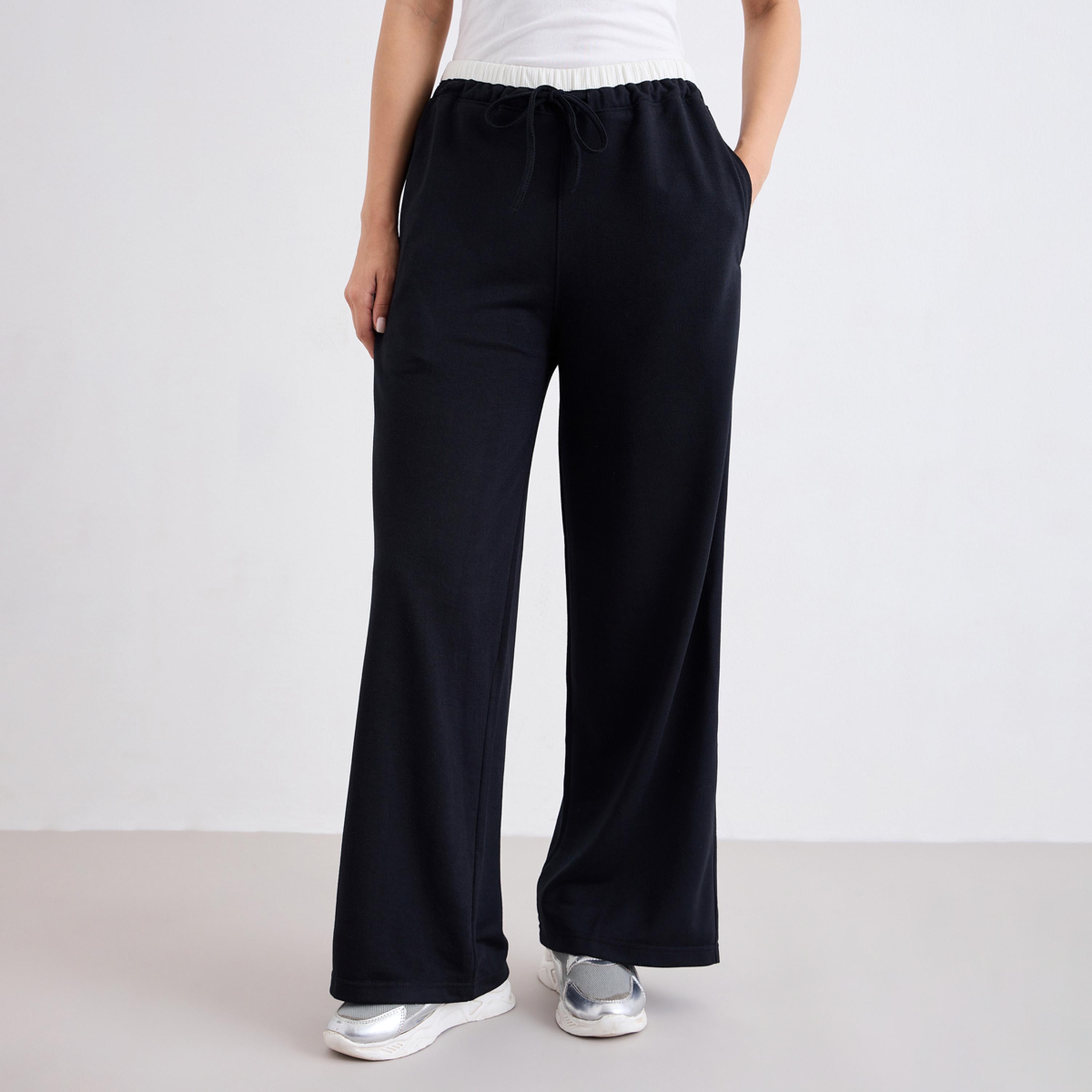 ستايلي - بنطال رياضي أسود واسع الساق مع رباط-women-clothing-bottoms-joggers-image-1