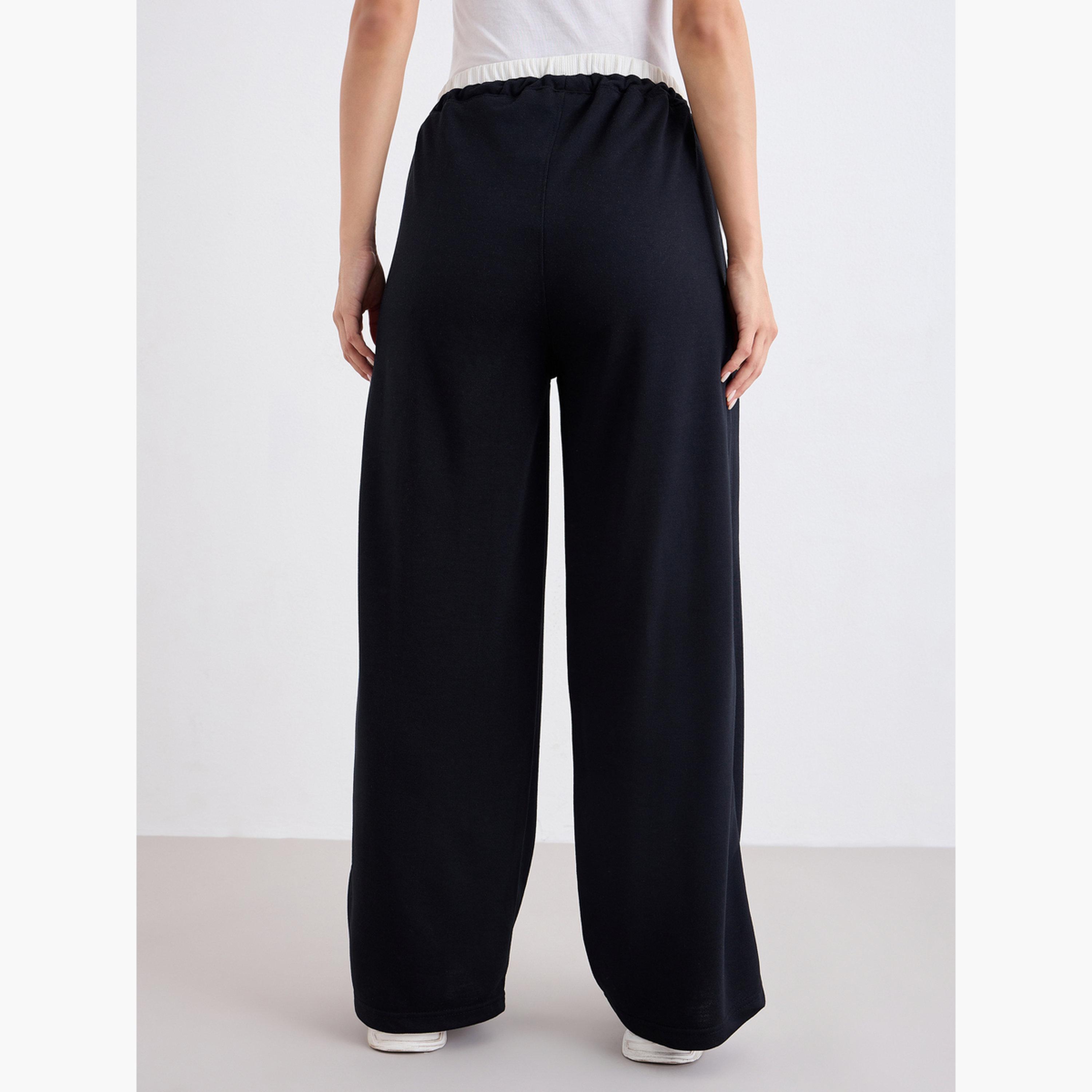 ستايلي - بنطال رياضي أسود واسع الساق مع رباط-women-clothing-bottoms-joggers-image-4