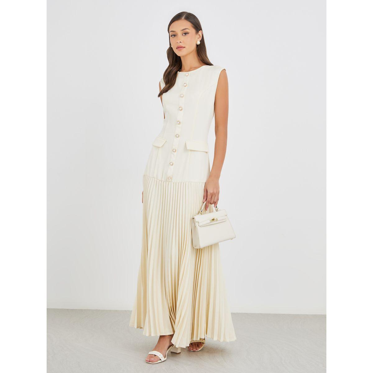 فستان طويل سادة بدون أكمام وتفاصيل كسرات-women-clothing-dresses-image-2