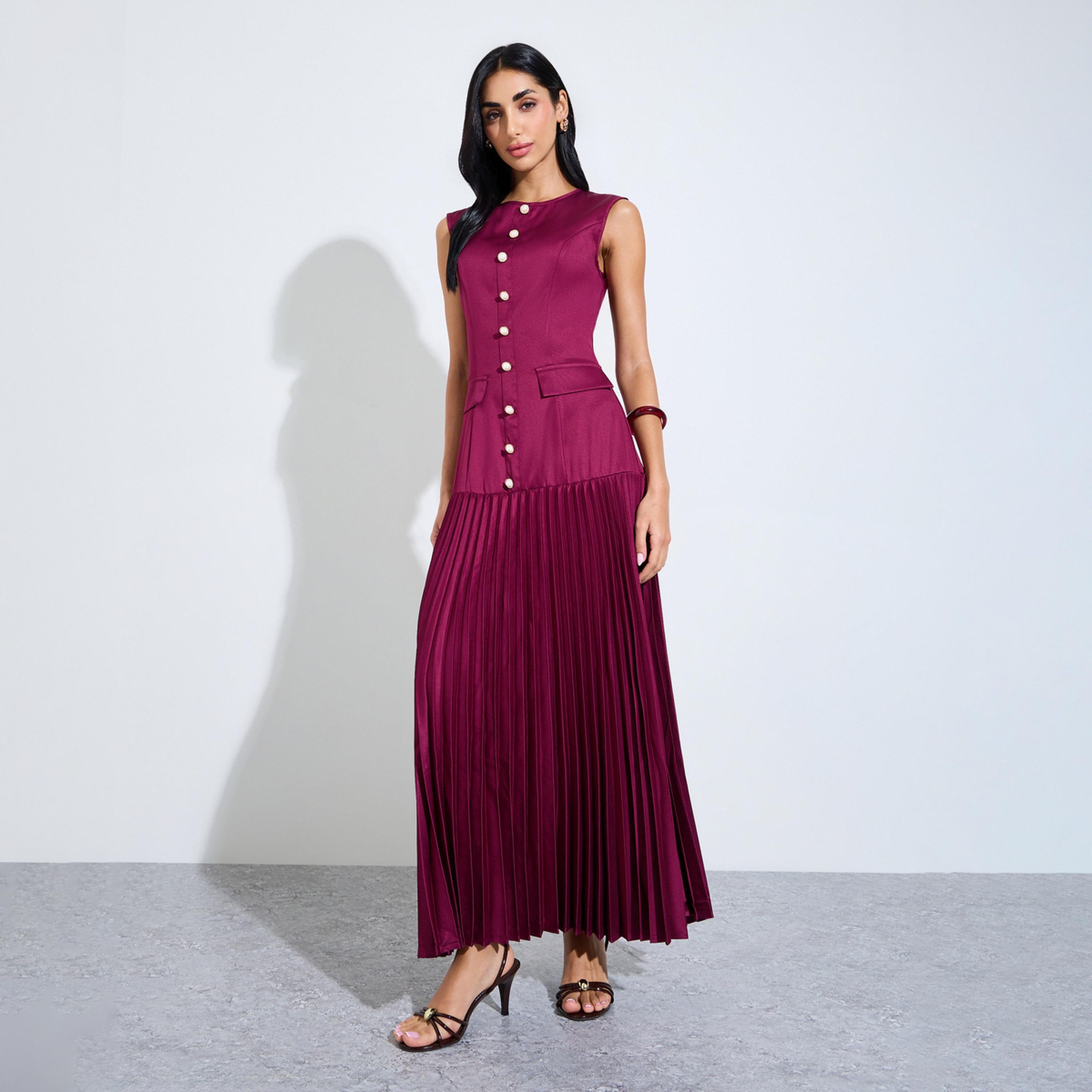فستان طويل بحافة واسعة وبكسرات بلا أكمام-women-clothing-dresses-image-1