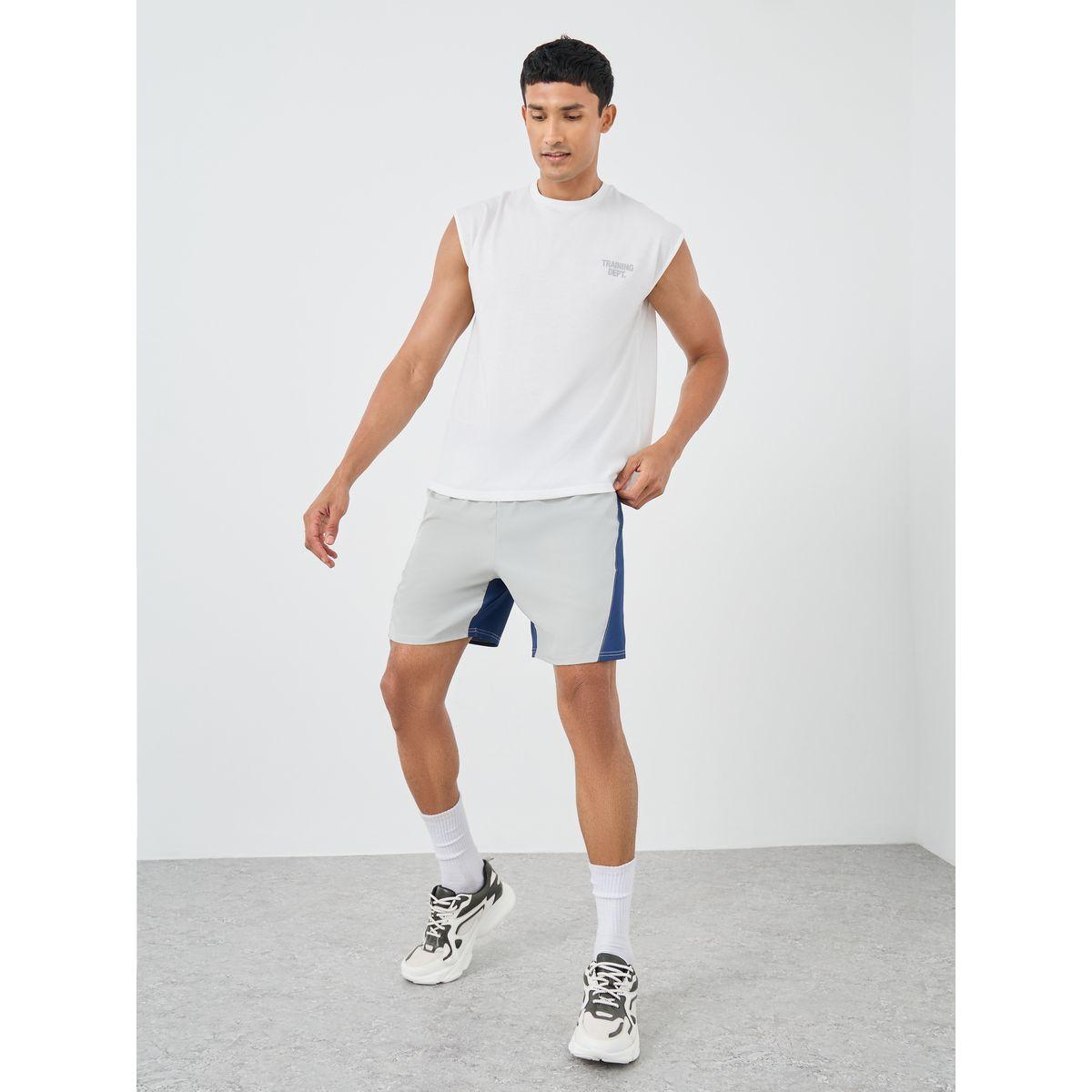 تيشيرت كت فضفاض بأكمام كاب وفتحة ذراع منخفضة-men-clothing-sportswearandactivewear-tshirtsandpolos-image-3