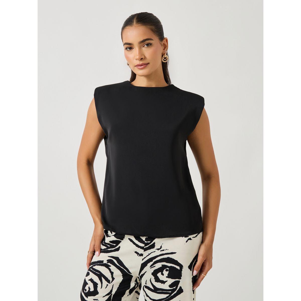 طقم منسق من بنطال بأرجل واسعة وبلوزة بلا أكمام-women-clothing-coordsets-image-2