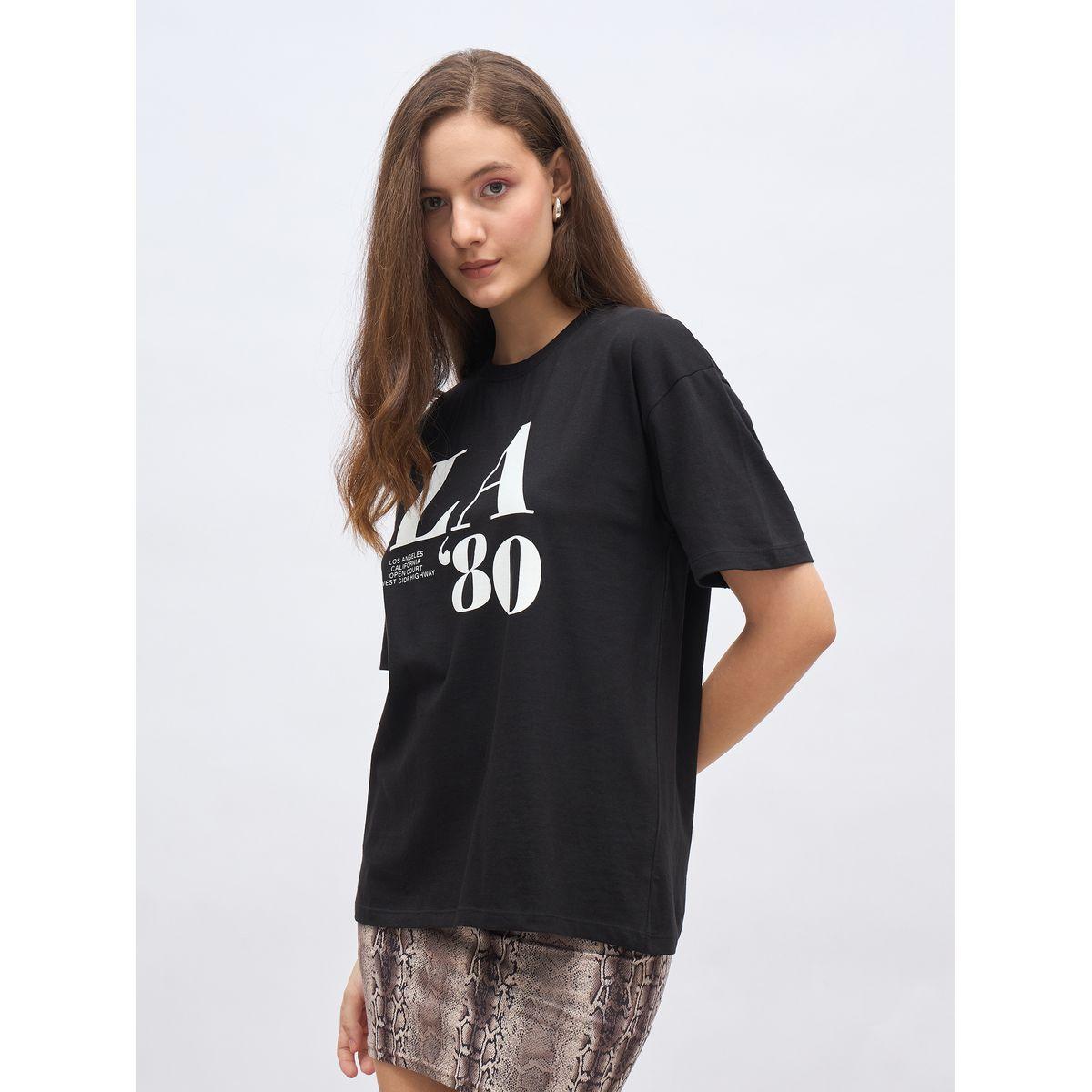 تيشيرت فضفاض طويل بطبعة جرافيك-women-clothing-tshirts-image-3