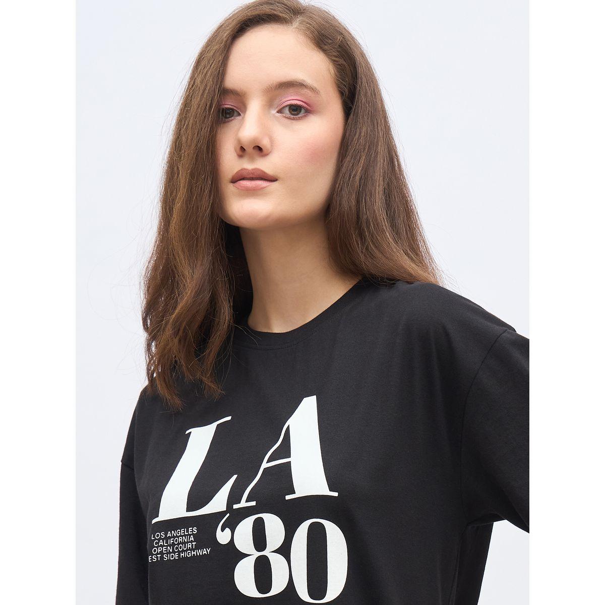 تيشيرت فضفاض طويل بطبعة جرافيك-women-clothing-tshirts-image-4