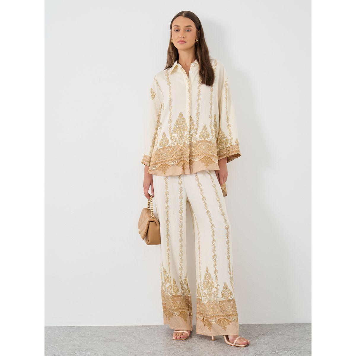 بنطال مُطبع بقصة أرجل واسعة-women-clothing-bottoms-trousers-image-1