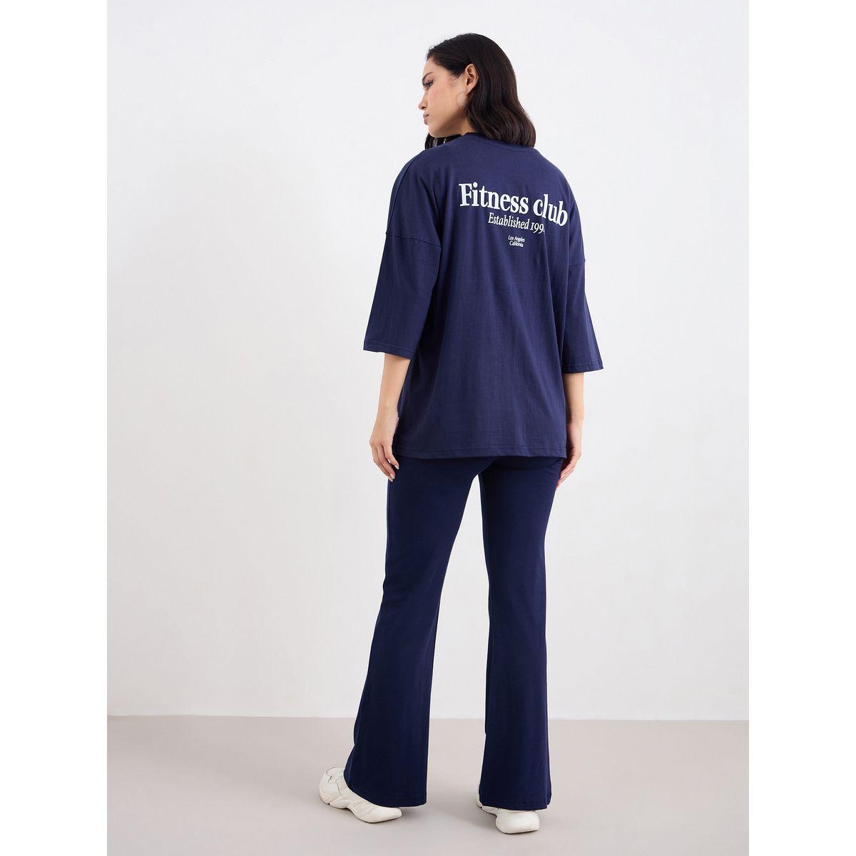 طقم منسق من ليقنز مع تيشيرت فضفاض مزين بشارة-women-clothing-coordsets-image-4