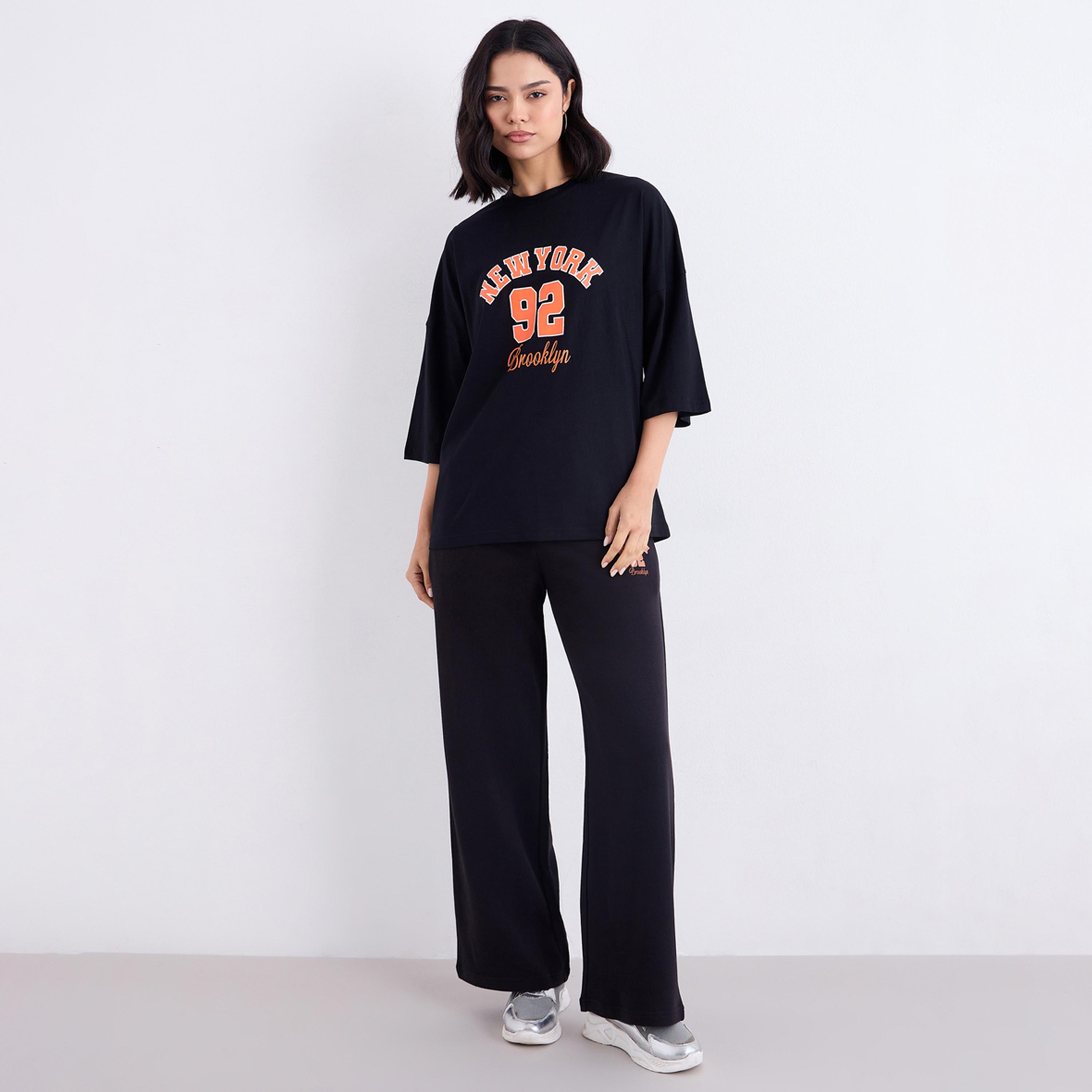 Styli Black Oversized Graphic T-Shirt and Joggers Co-Ords-women-clothing-coordsets-image-1