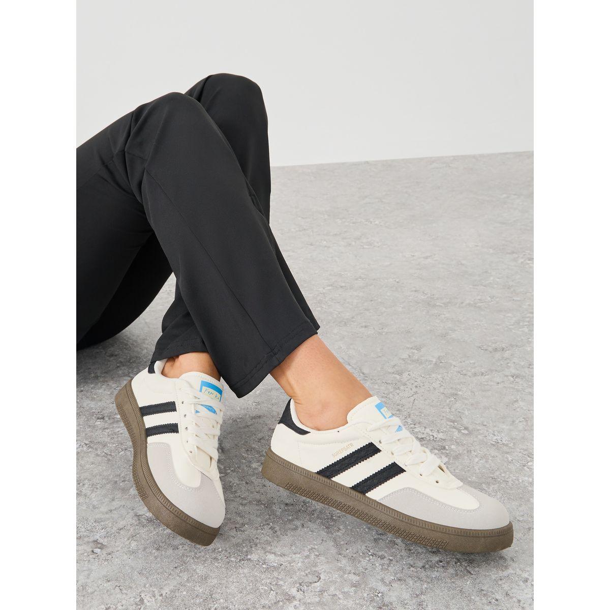 حذاء سنيكرز مخطط مع أربطة-women-shoes-sneakers-image-1