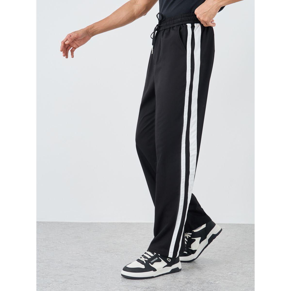 جوغر فضفاض بتفاصيل أنبوب جانبي-men-clothing-bottoms-joggers-image-1