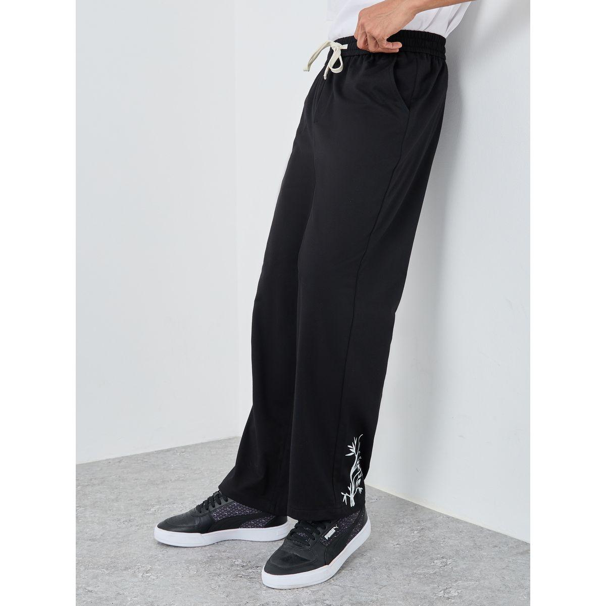 جوغر بقصة مريحة مع طبعة جرافيك-men-clothing-bottoms-joggers-image-1