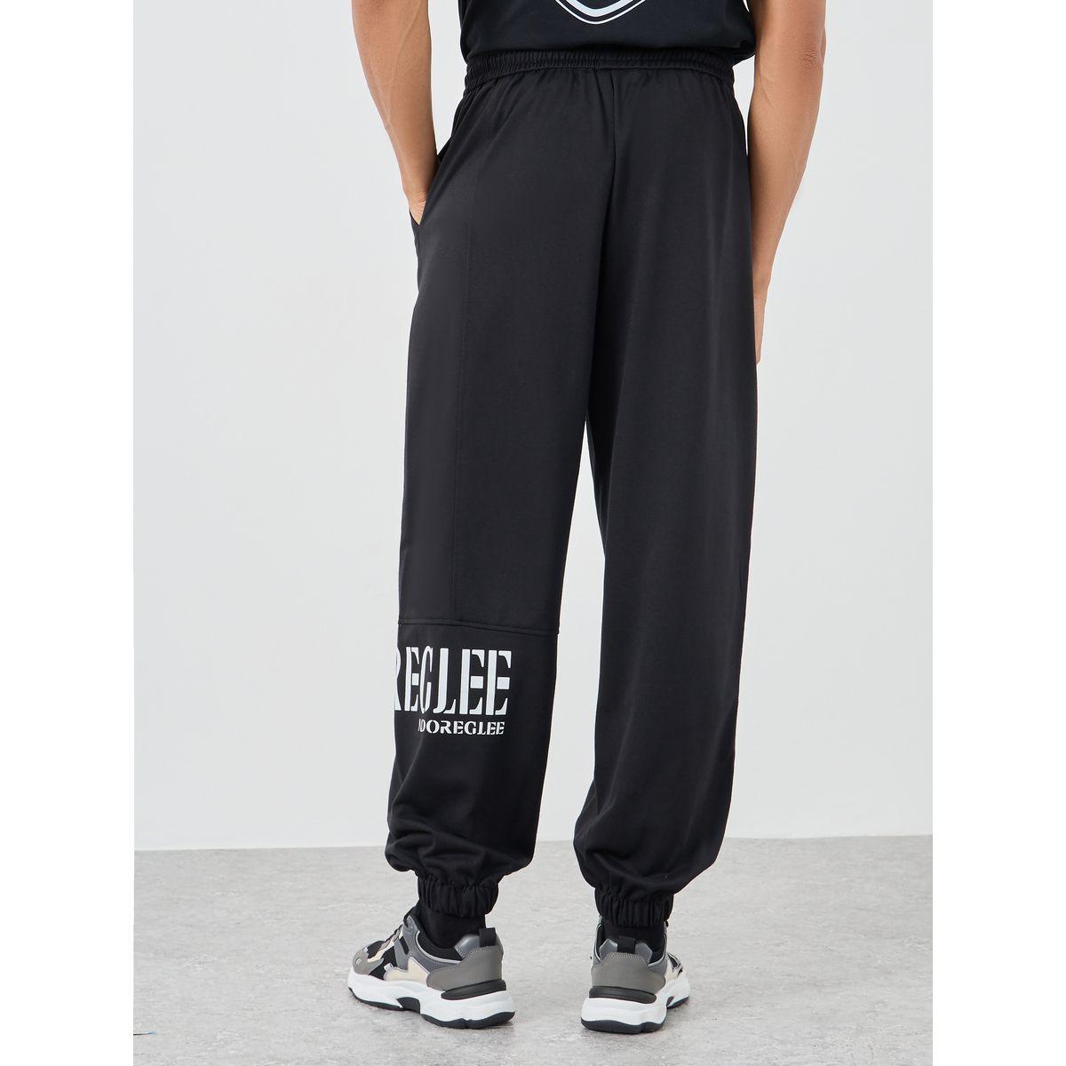 جوغر فضفاض بطبعة بليسمنت-men-clothing-bottoms-joggers-image-4