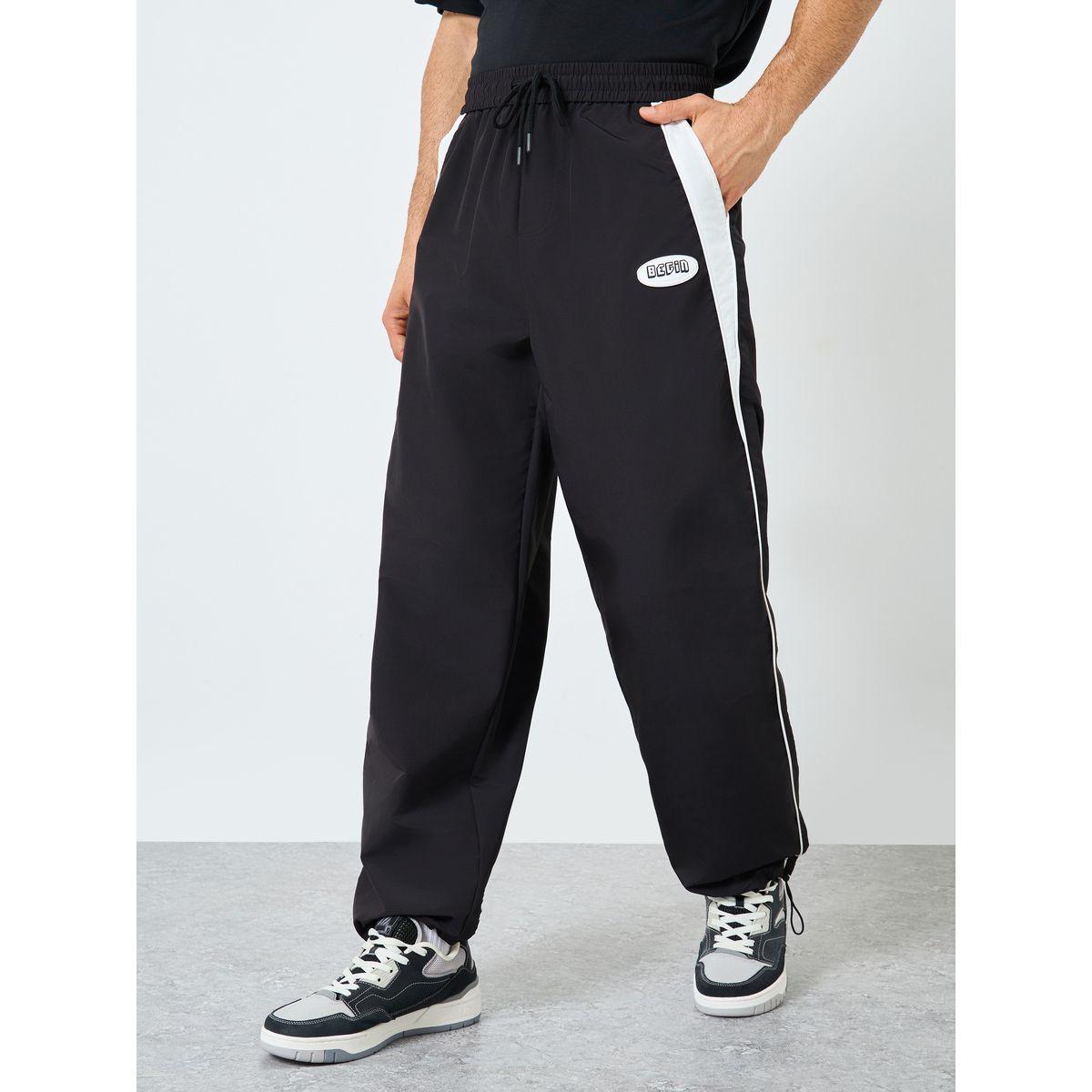 Styli Black Relaxed Fit Joggers with Side Piping and Placement Print-men-clothing-bottoms-joggers-image-1