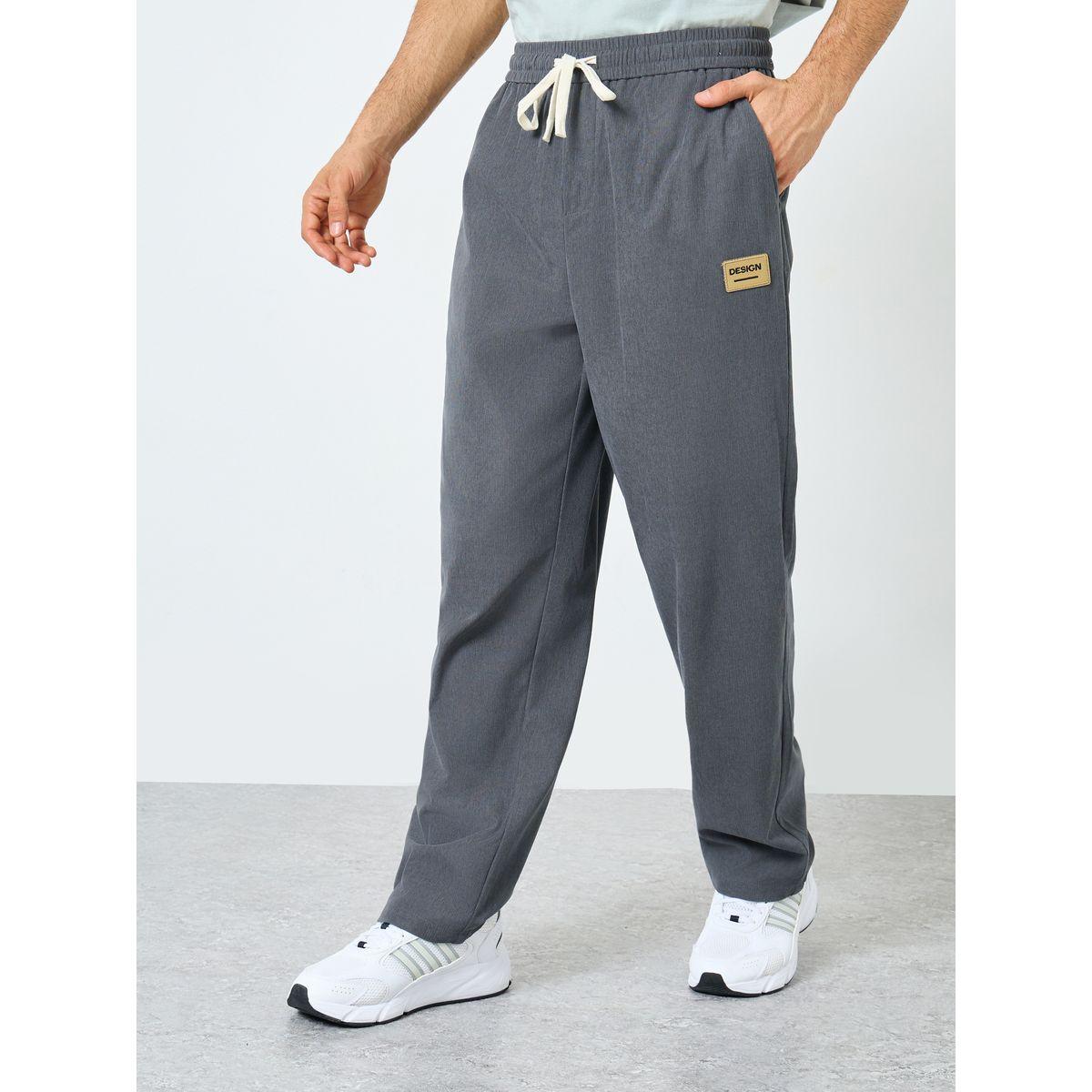 Styli Relaxed Fit Open Hem Joggers with Badge Detail and Contrast Drawcord-men-clothing-bottoms-joggers-image-1