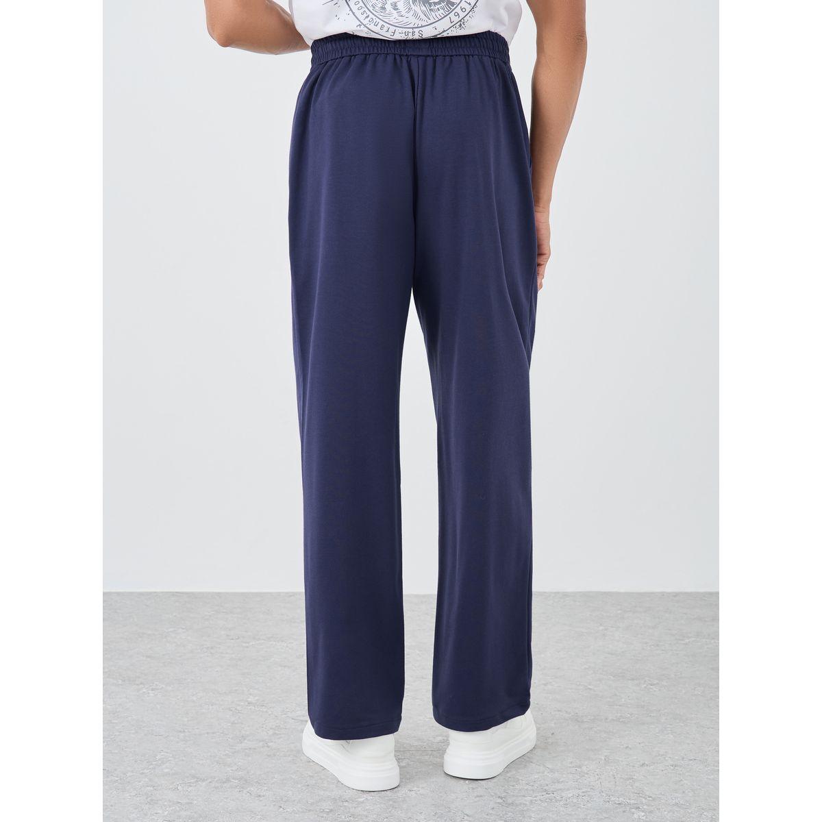 جوغر مُطبع بقصة مريحة مع تفاصيل أربطة-men-clothing-bottoms-joggers-image-4