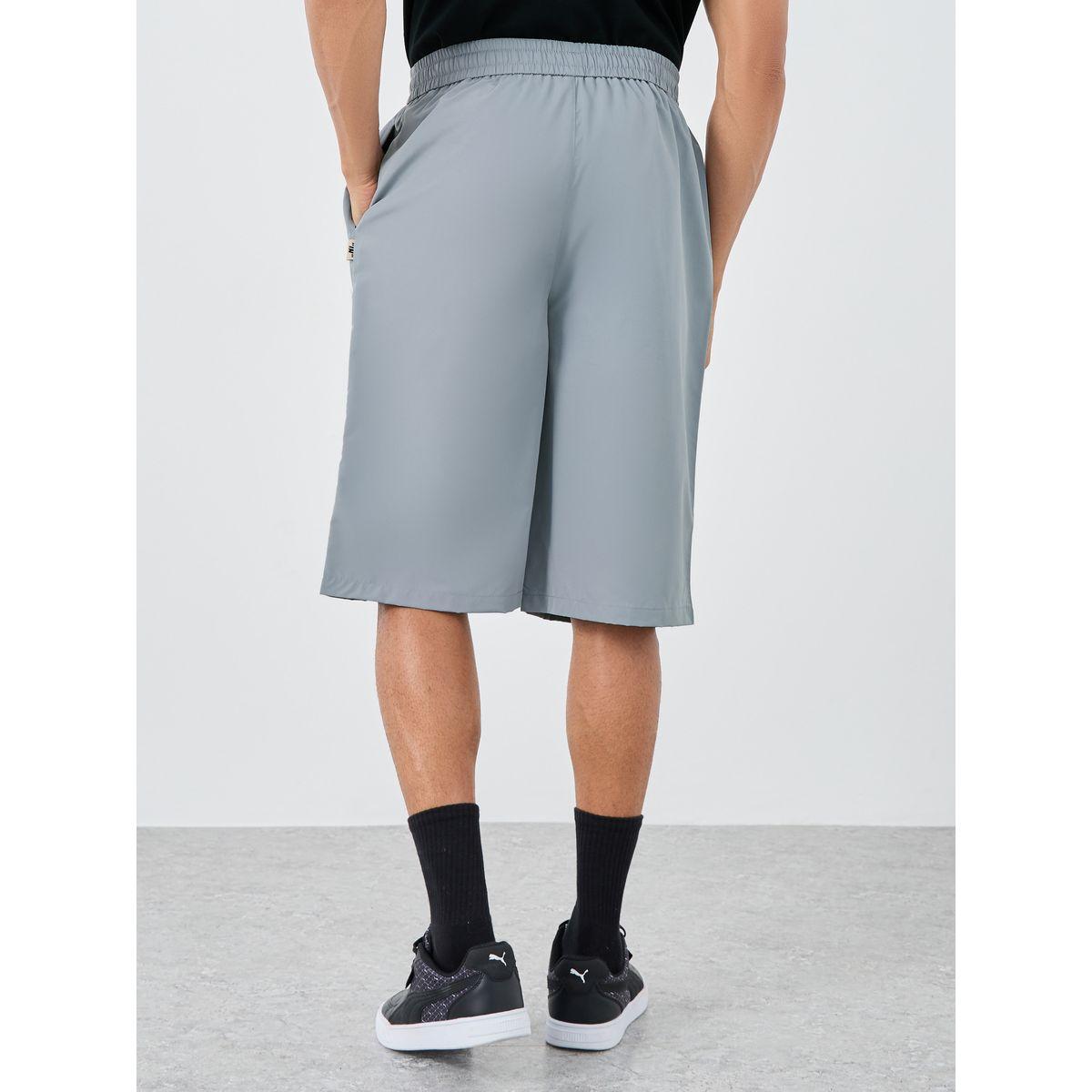 شورت فضفاض بتفاصيل شارة-men-clothing-bottoms-shorts-image-4