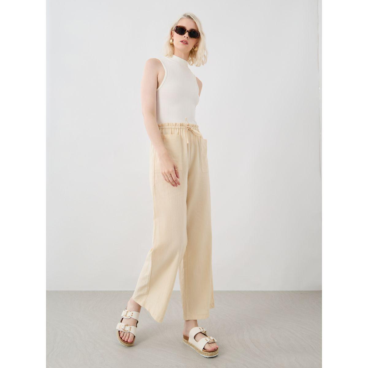 Styli Women Beige Solid Drawstring Waist Wide Leg Pants with Patch Pockets-women-clothing-bottoms-trousers-image-1