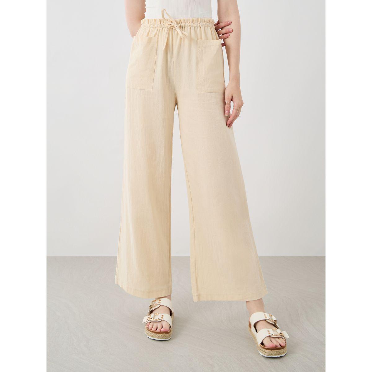 Styli Women Beige Solid Drawstring Waist Wide Leg Pants with Patch Pockets-women-clothing-bottoms-trousers-image-2