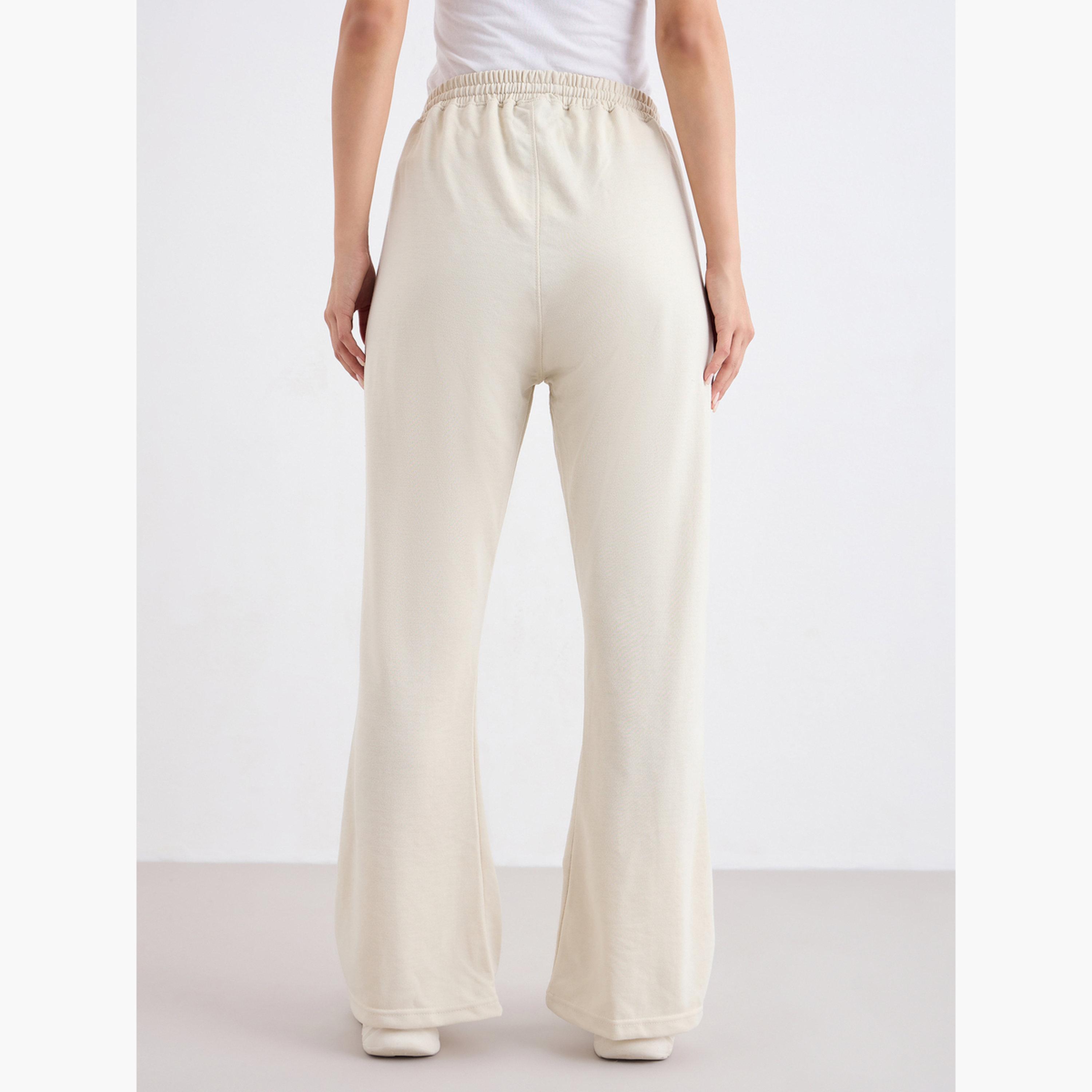 ستايلي - بنطال رياضي كريمي واسع الساق مع تفاصيل ثنية-women-clothing-bottoms-joggers-image-4