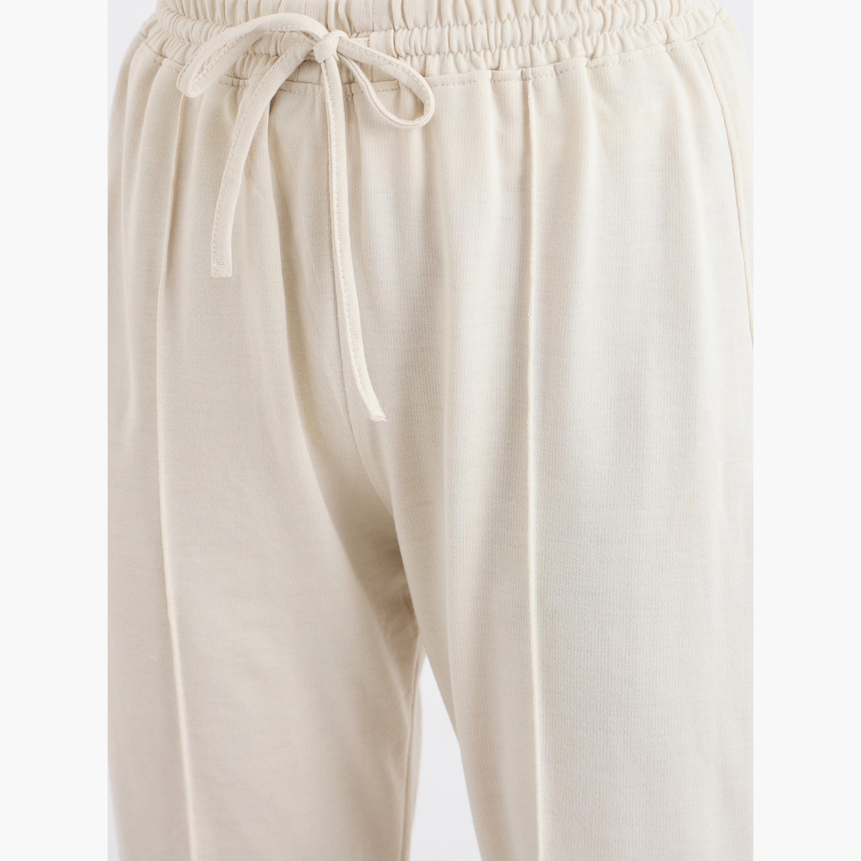 Styli Cream Boot Flared Joggers with Pintuck Detail-women-clothing-bottoms-joggers-image-5