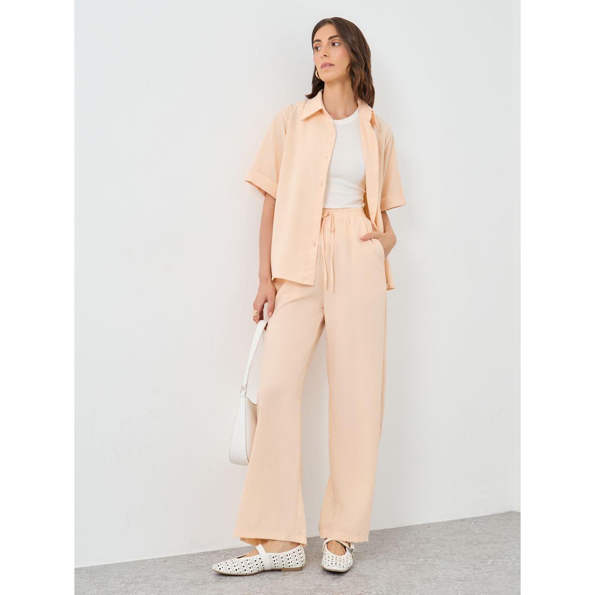 طقم منسق من بنطال بأرجل واسعة مع بلوزة سادة-women-clothing-coordsets-image-1